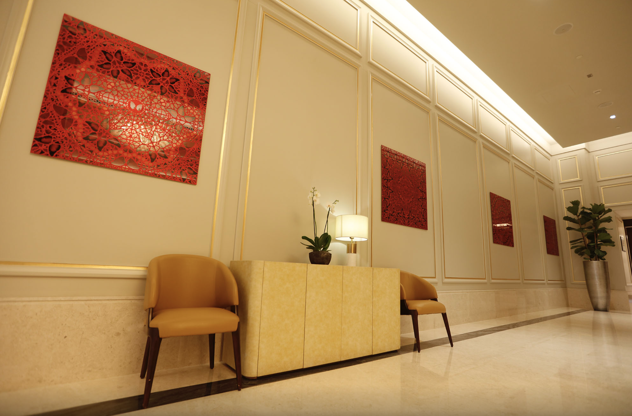 Damien Hirst artwork installed in the lobby of St. Regis Marsa Arabia Private Island, Doha as part of the curated hotel art program by Core Art Strategies.