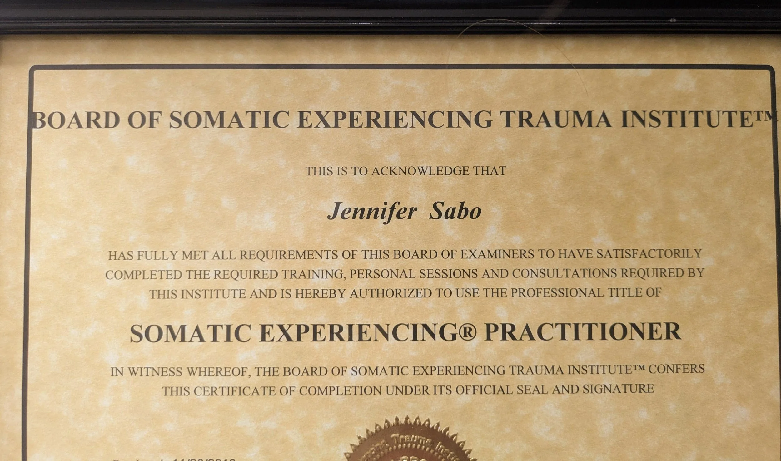 What Somatic Experiencing Actually Is (and Why the Letters After My Name Matter)