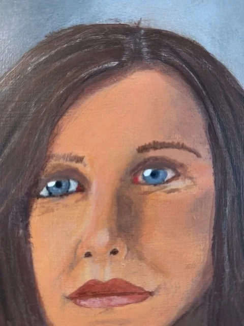 Close-up of Maria's face and thoughtful expression in an acrylic portrait by Bonnie Seide