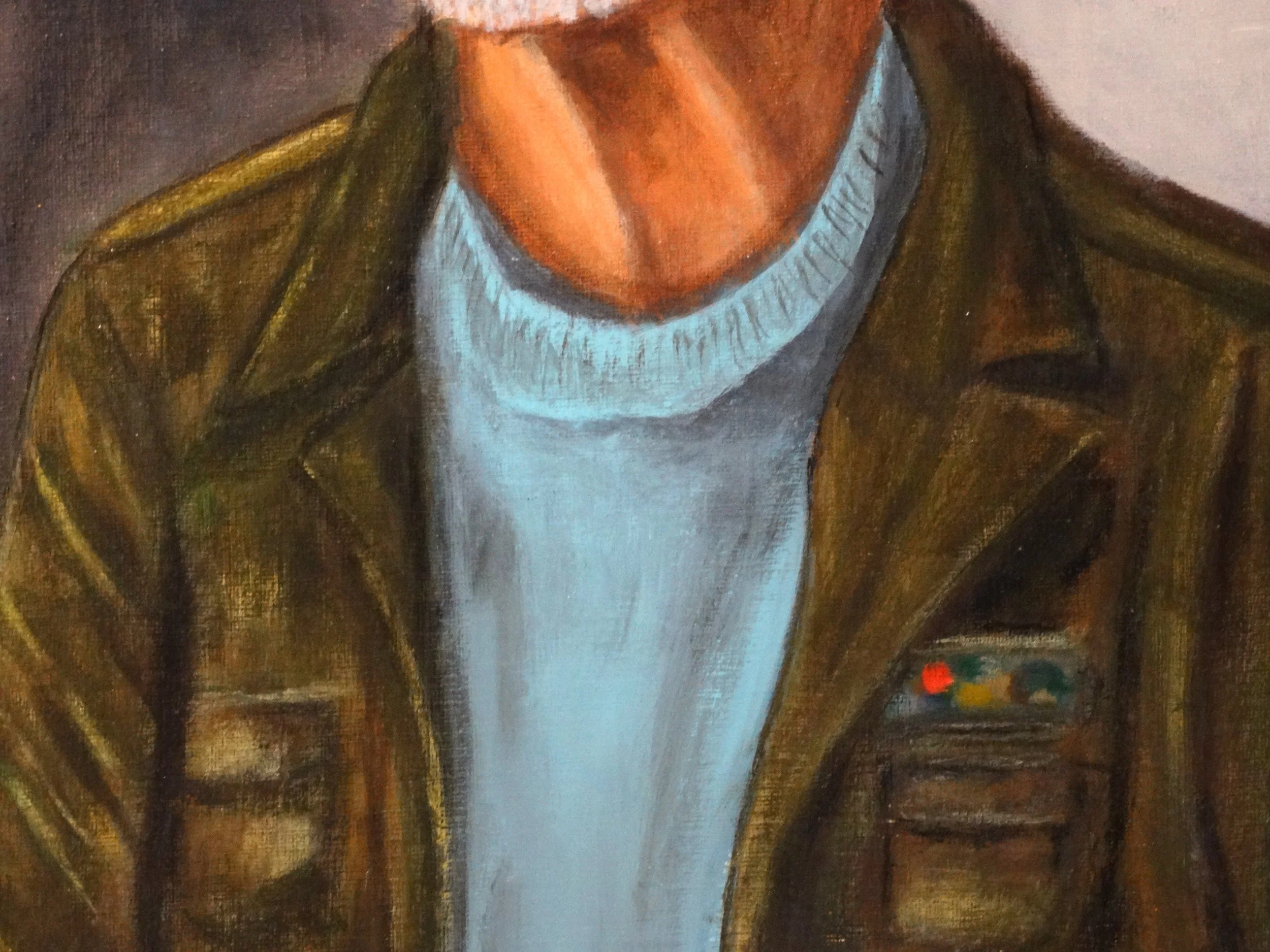 Brushwork detail of the veteran's jacket and clothing in Quiet Valor, an oil painting by Bonnie Seide