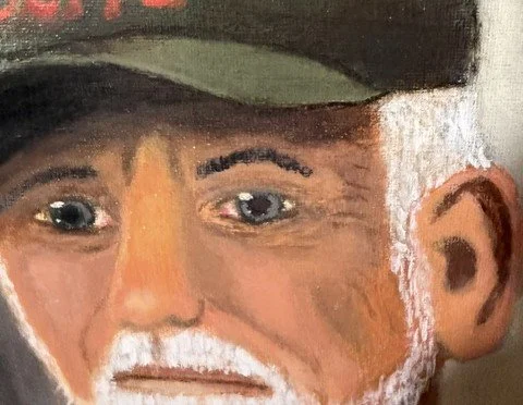Close-up of the veteran's face and expressive brushwork in Quiet Valor by Bonnie Seide