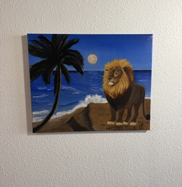 Moonlit Majesty, a 16 x 20 original oil lion painting by Bonnie Seide, displayed on a wall.