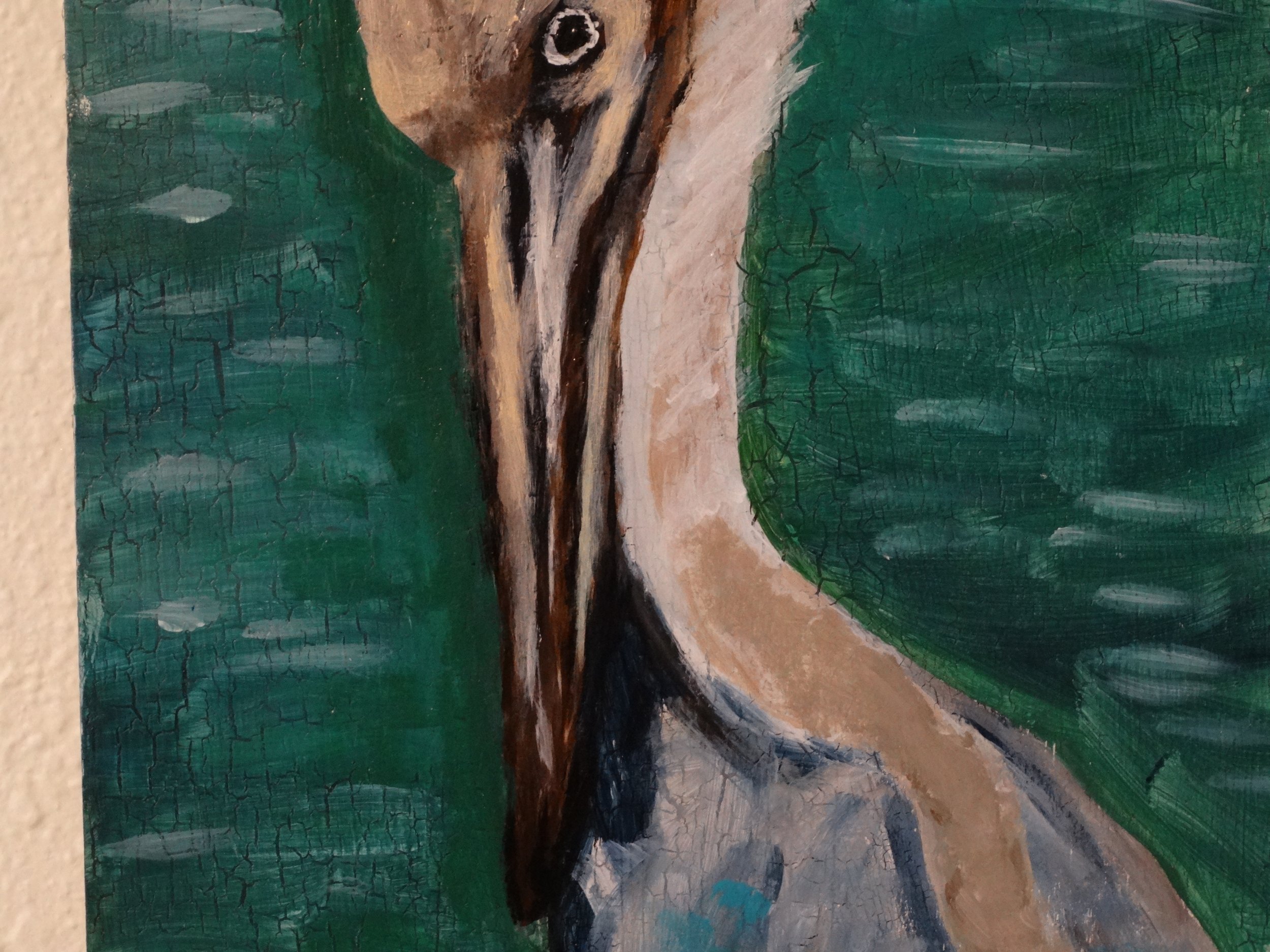 Close-up detail of the pelican's beak, eye, and head feathers in Dockside Sentinel, an acrylic painting by Bonnie Seide