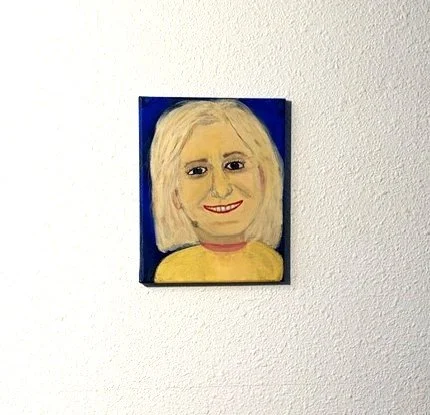 My First Portrait, an 8 x 10 original acrylic painting by Bonnie Seide, displayed on a wall.