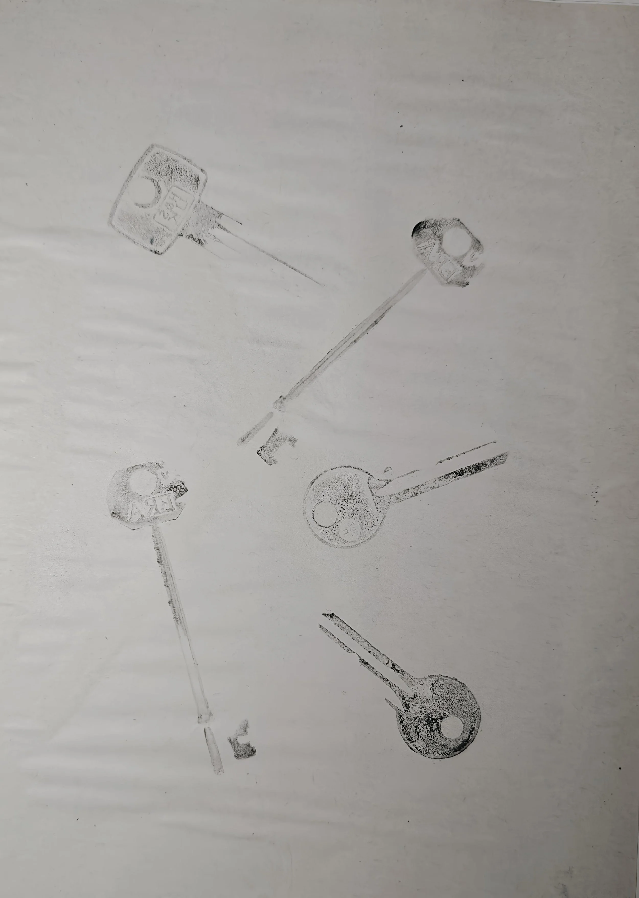 Artwork by Shaun Bell featuring a black and white faded print of overlapping keys.