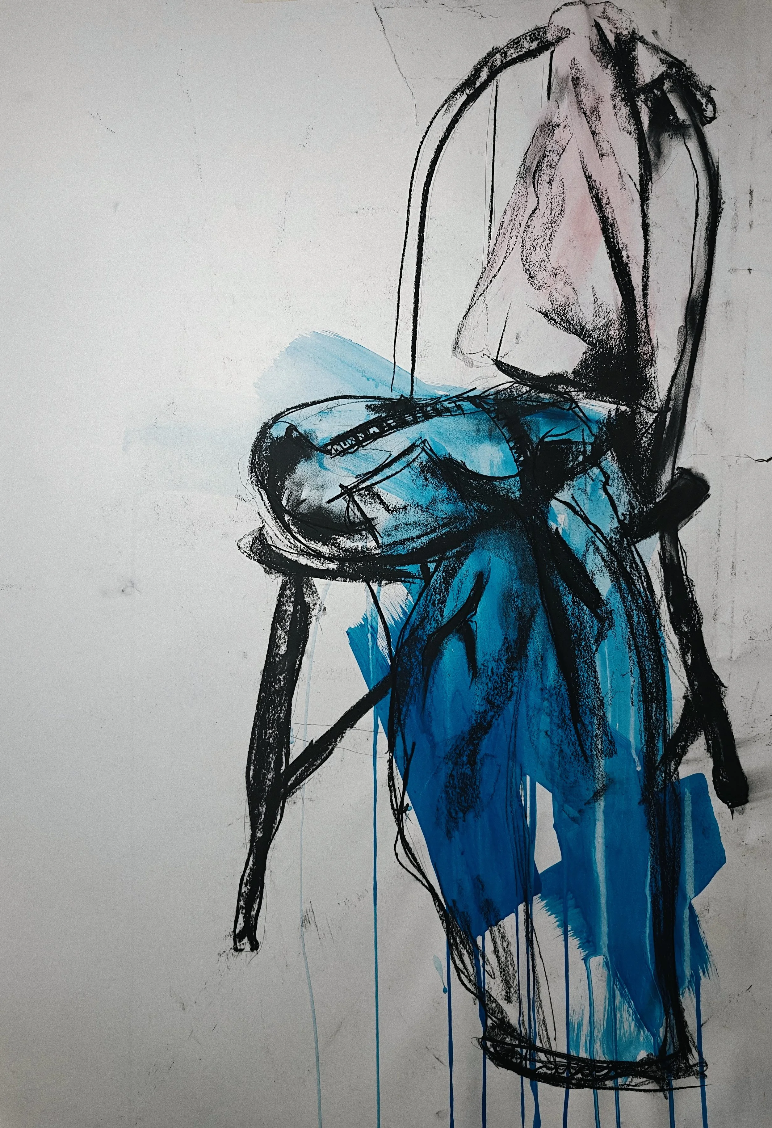 Artwork by Shaun Bell and Miah Gill. Expressive charcoal and acrylic painting of empty chair with clothing, exploring absence and memory