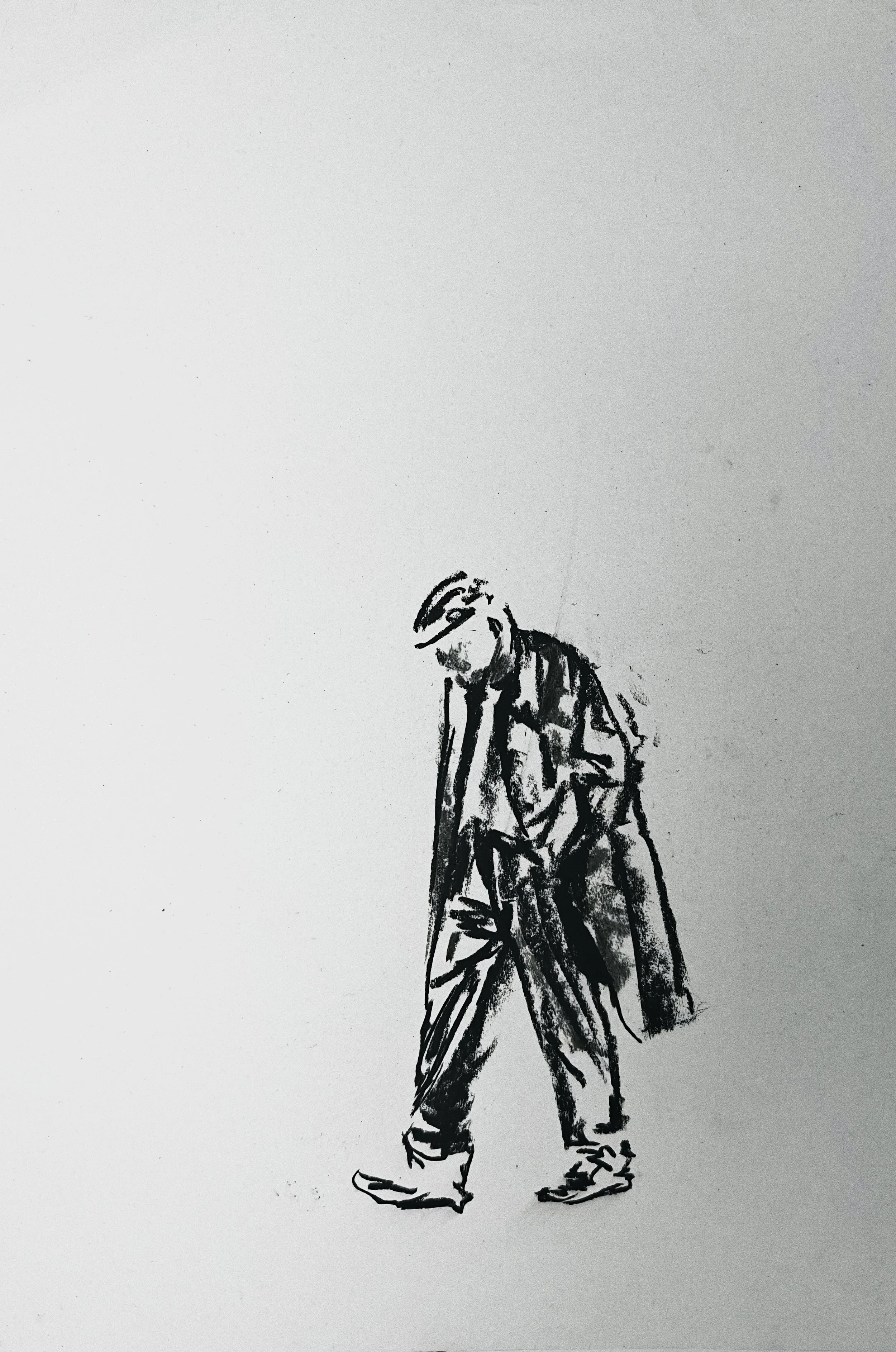 Charcoal figure drawing by Shaun Bell. Contemporary minimalist figurative artwork exploring urban isolation, anonymous city life, and human transience. Expressive tonal charcoal on paper with strong negative space and gestural mark-making.