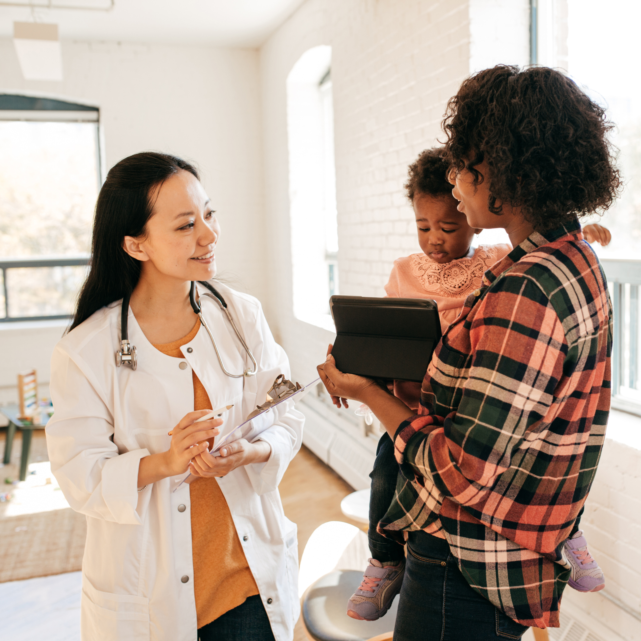 Parent Talking To Pediatrician