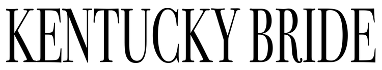 Close-up of a black and white dial indicator gauge with a needle pointing to zero.