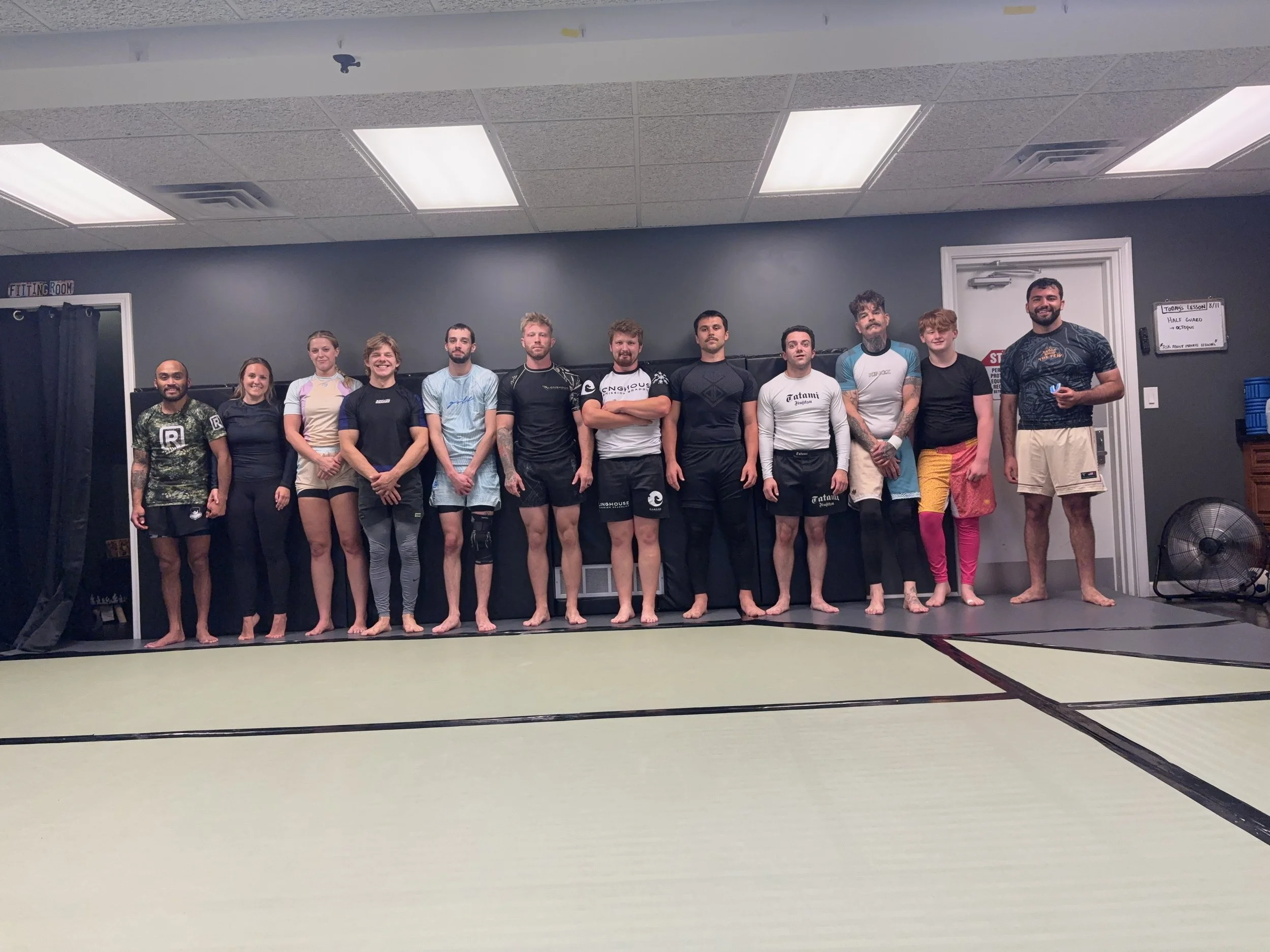 The Garage Jiu-Jitsu students and coaches after a no-gi class in Commerce Township, Michigan.