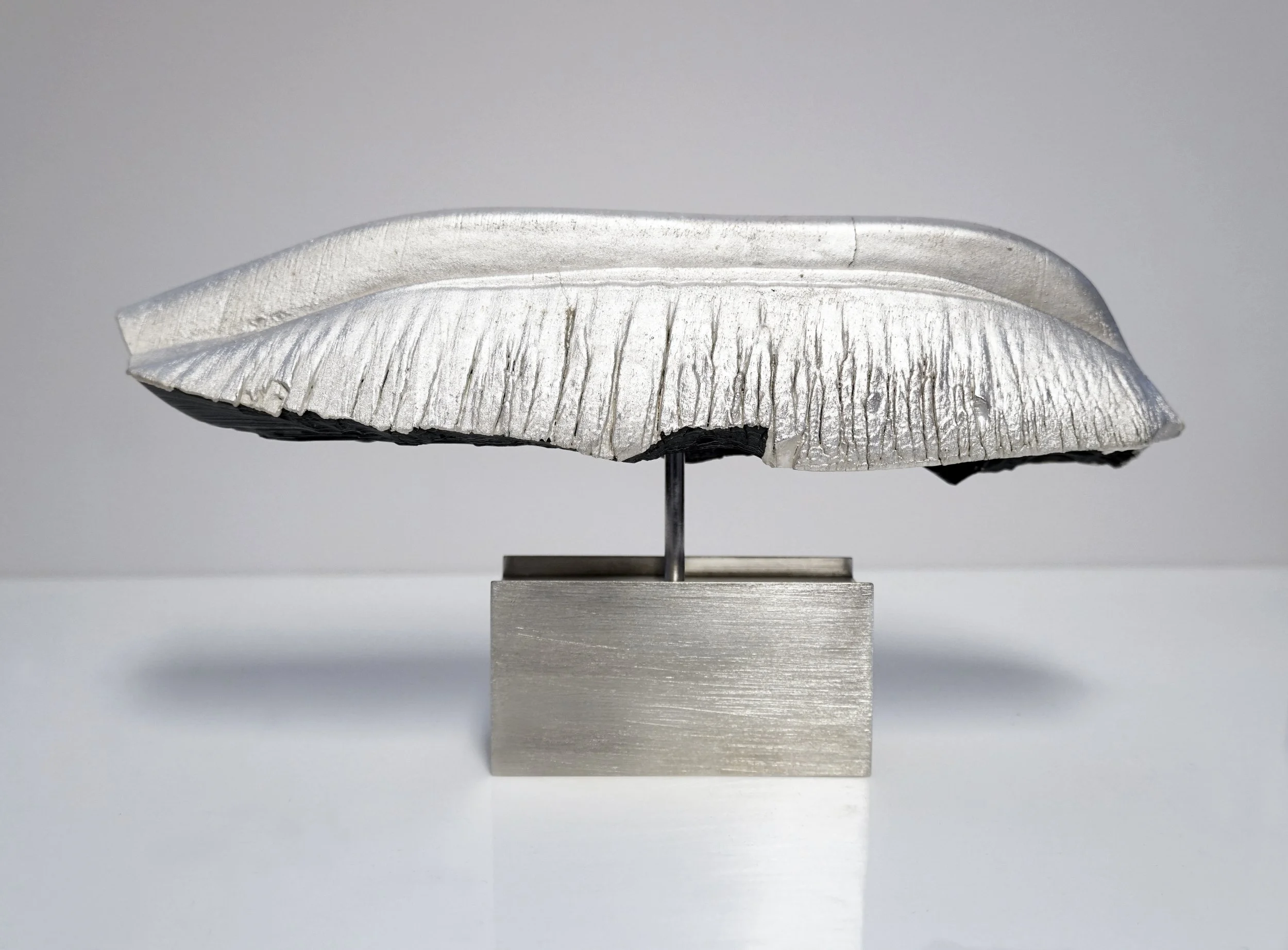 Conversation Piece, Metamorphic, object III, 2025 | Accumulated automotive paints, silver 925, fine silver 