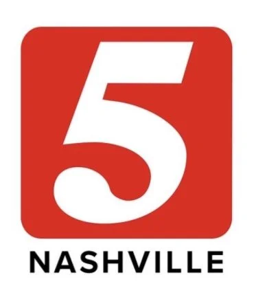 Red square sign with a large white number 5 and the word 'NASHVILLE' underneath in black letters.