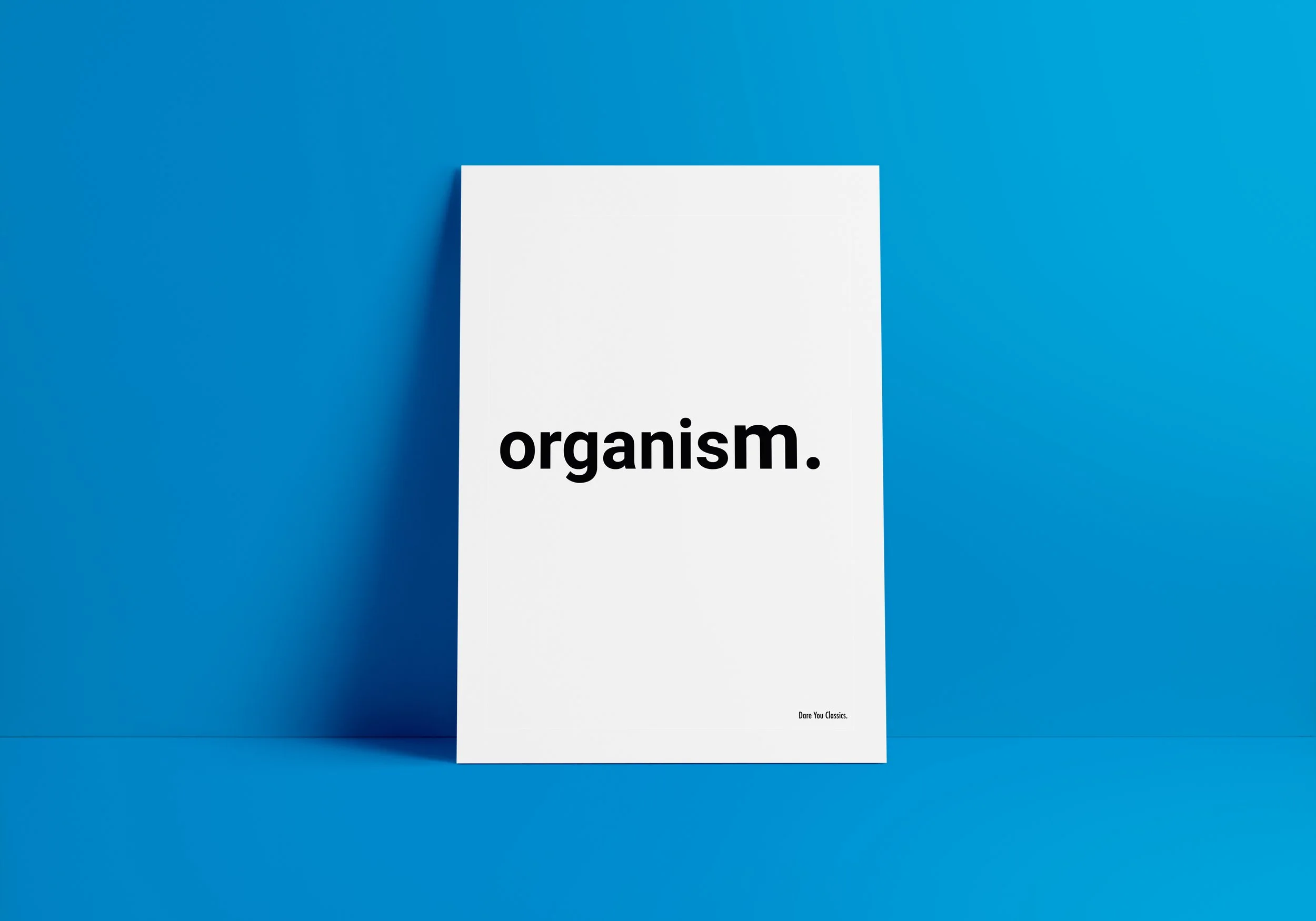 Graphic design. Classical music claims. White poster with the word 'organism.' in bold black text, set against a blue background.