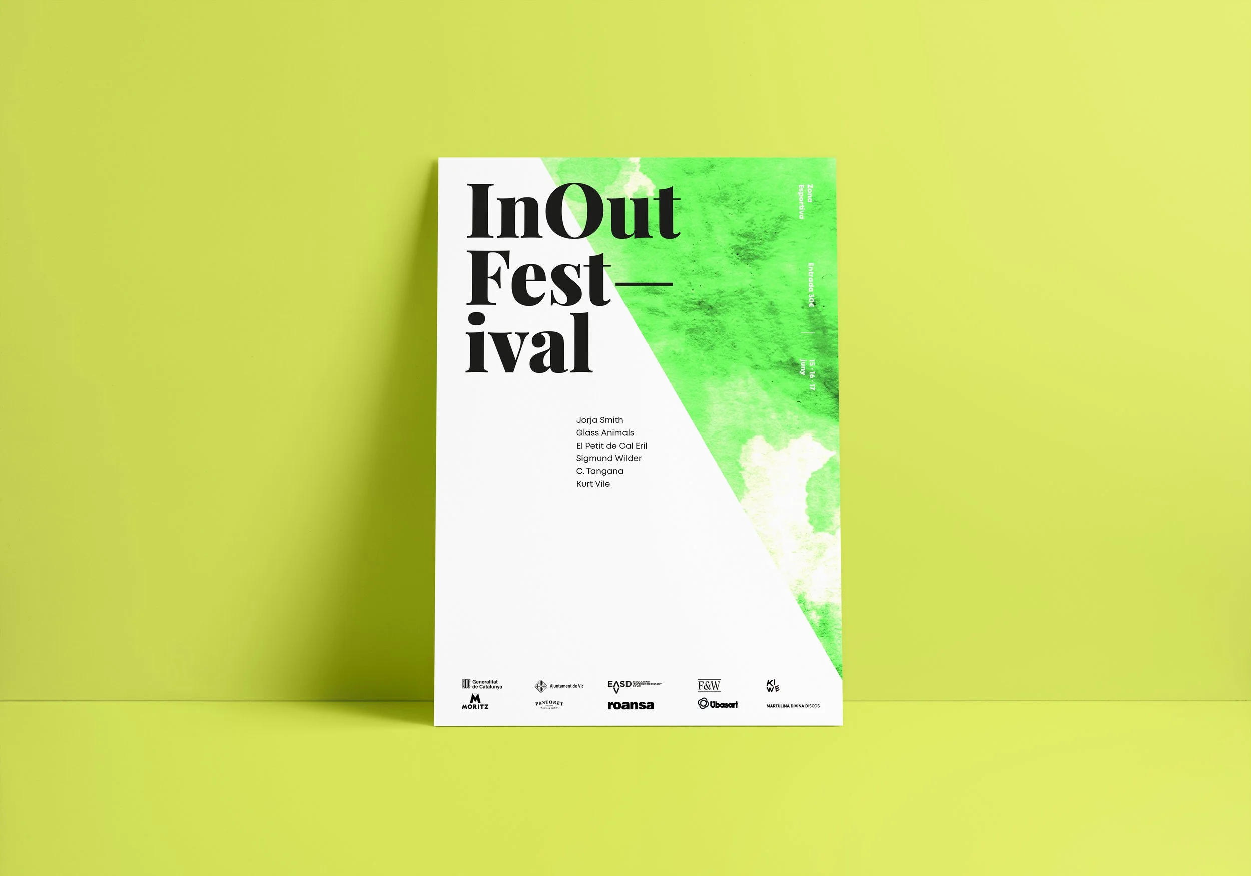 Graphic design. End-of-degree project. Poster for InOut Festival with green and white geometric design, black text of festival name, list of artists, and sponsor logos at the bottom, on a yellow wall.