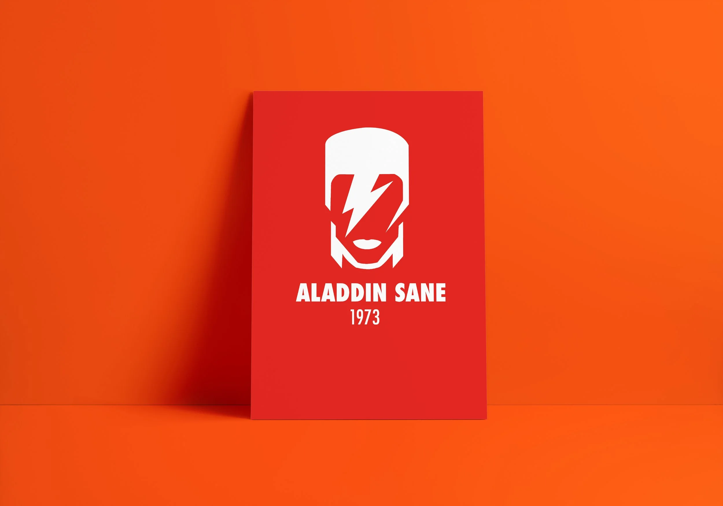 Graphic design. Cronology David Bowie. A red poster with a stylized white face and a lightning bolt over the eyes. Text reads 'ALADDIN SANE 1973'.