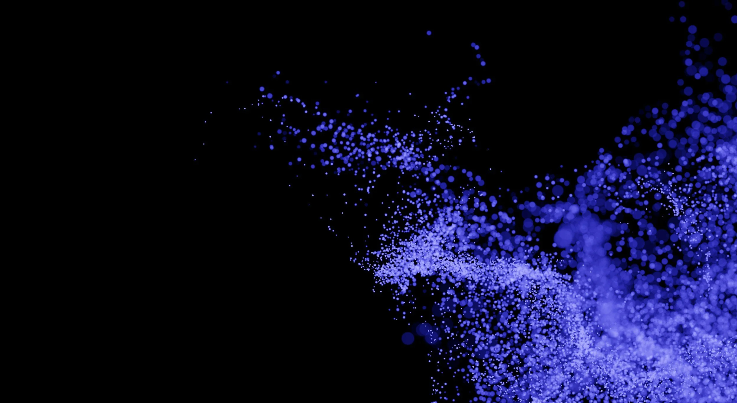 Nuages de points lumineux bleus sur fond noir, créant un effet de mouvement dynamique.