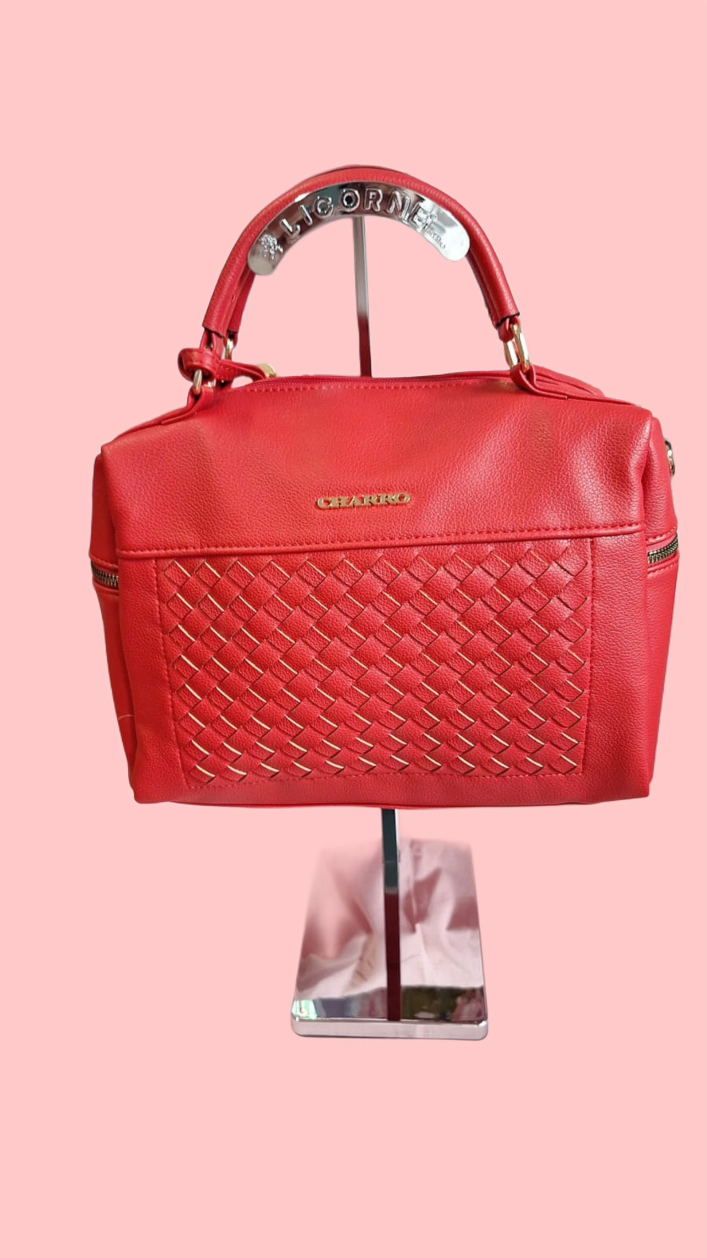 Borsa a mano rossa con lavorazione intrecciata frontale