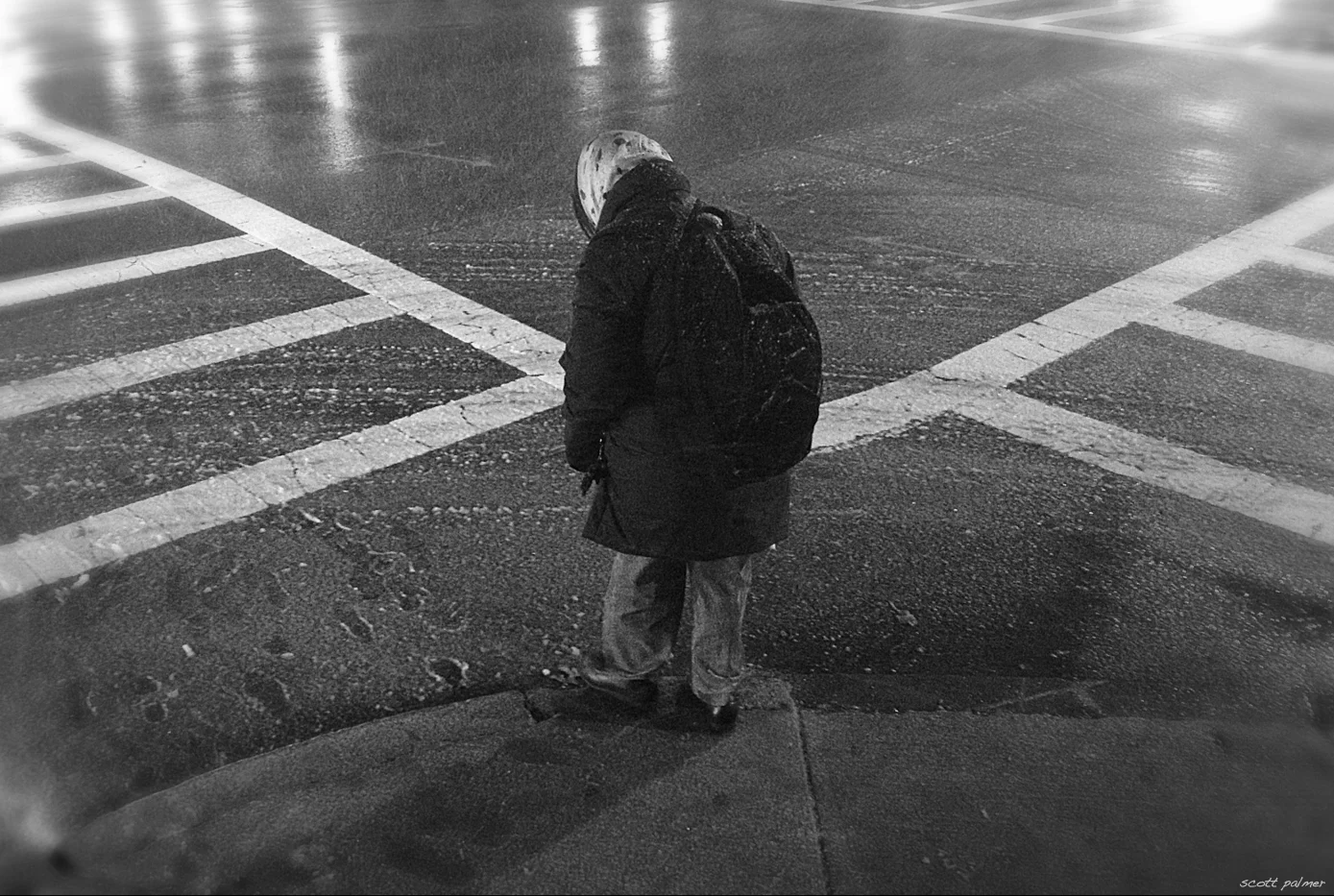  A WOMAN WAITS TO CROSS A SLUSHY BOYLSTON STREET 