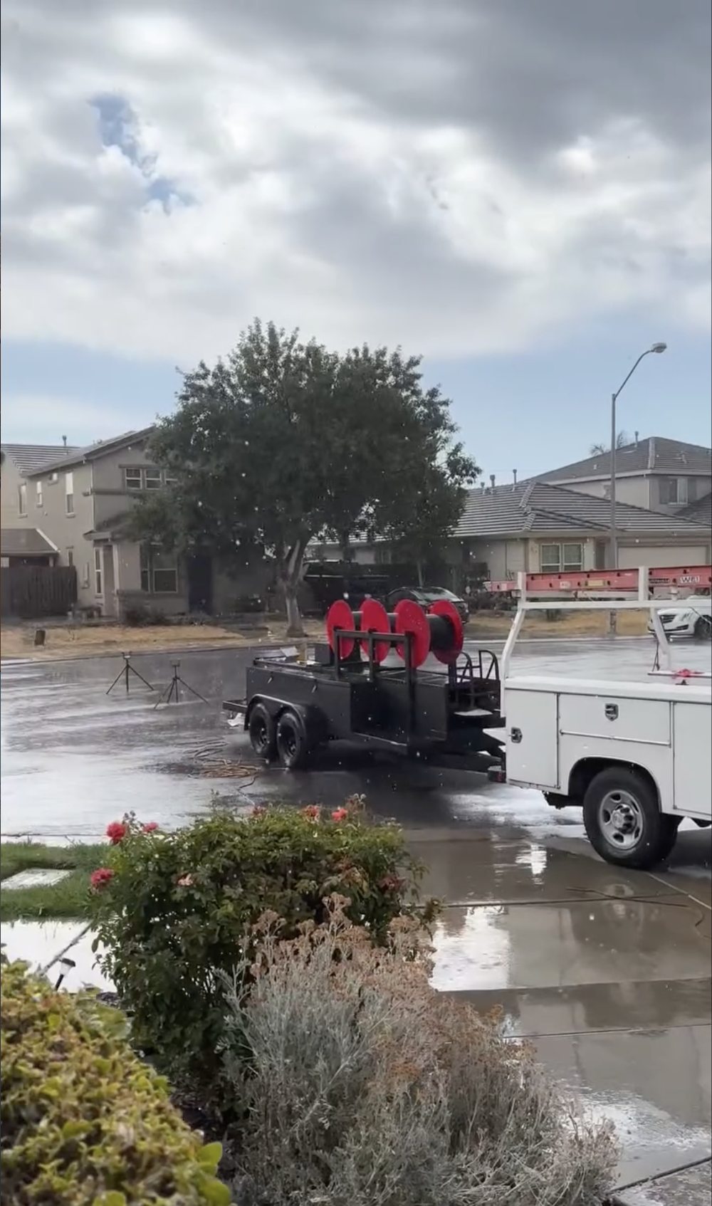 Custom metal gutters being made in front of a house in Salinas, CA. 