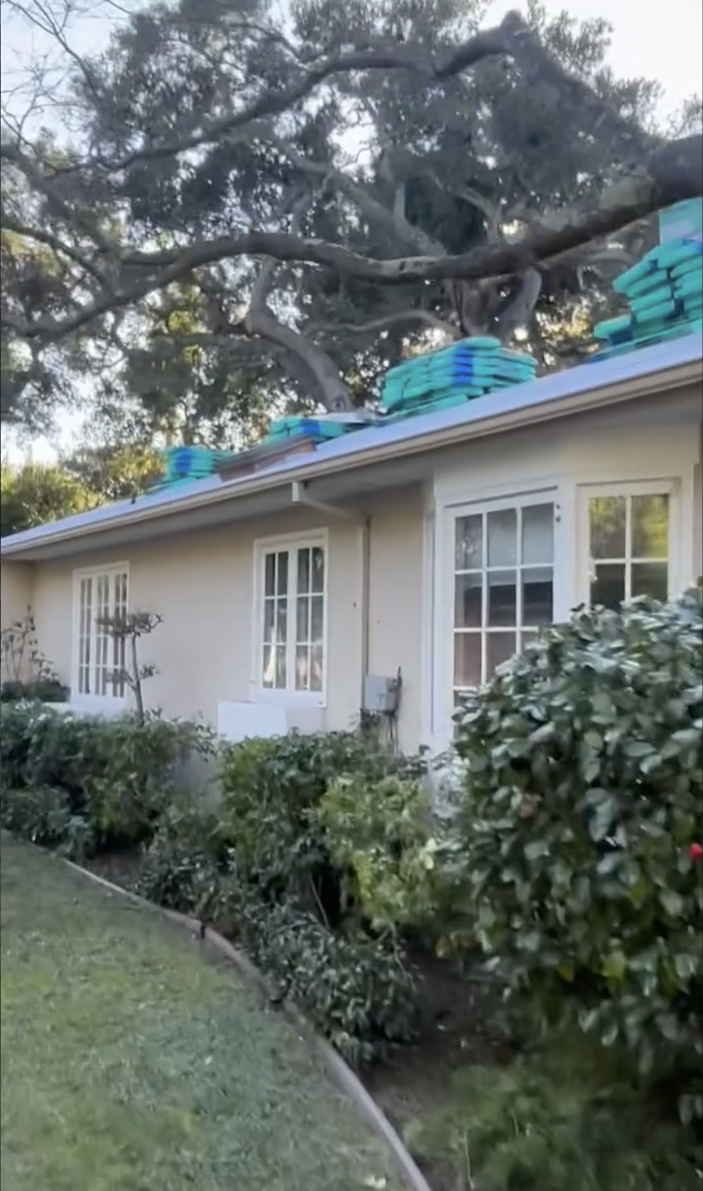 A house getting a roof repair in San Benito County. 