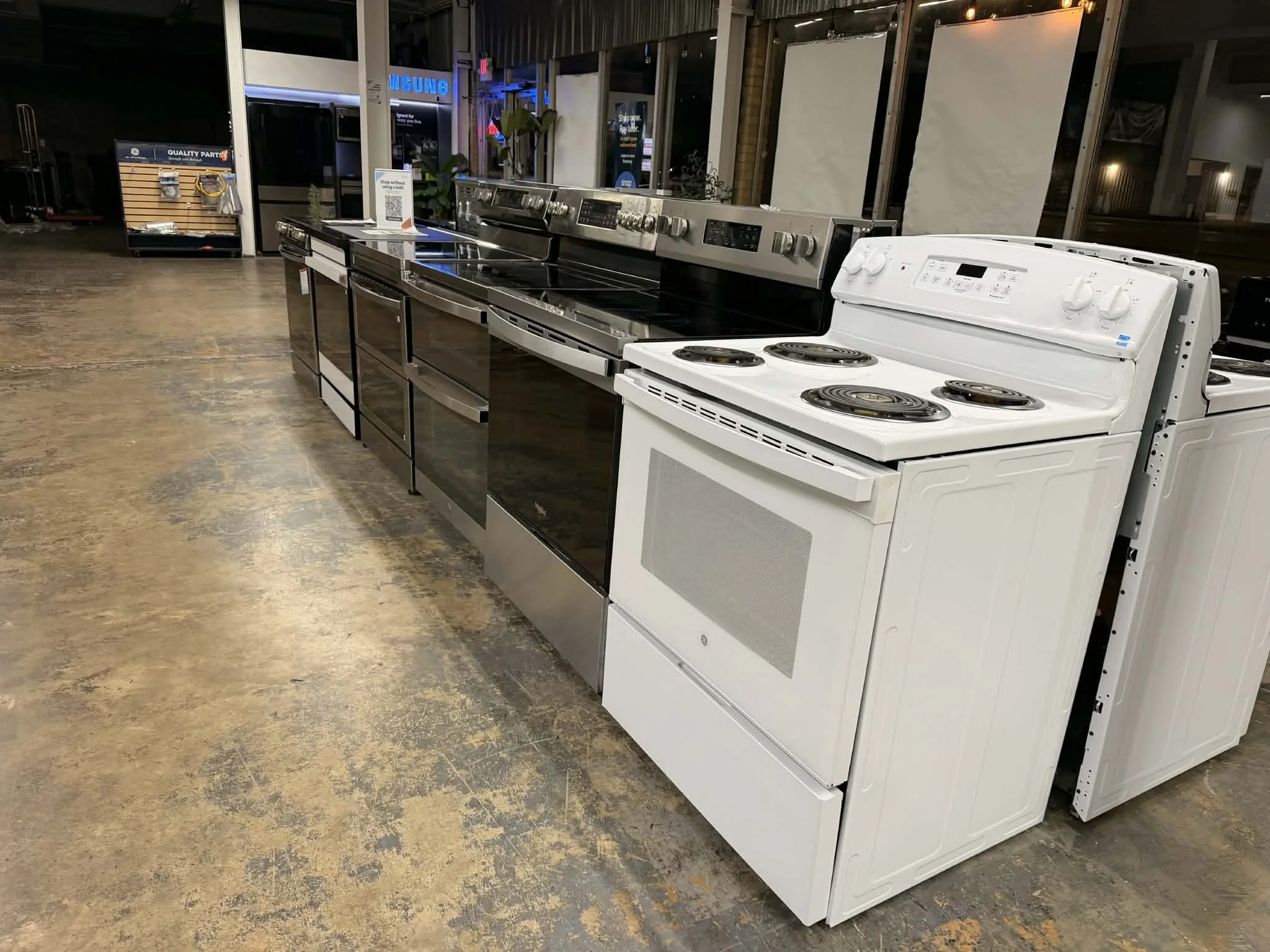 An array of stoves and ovens on sale at Huntsville, AL discount appliance store 