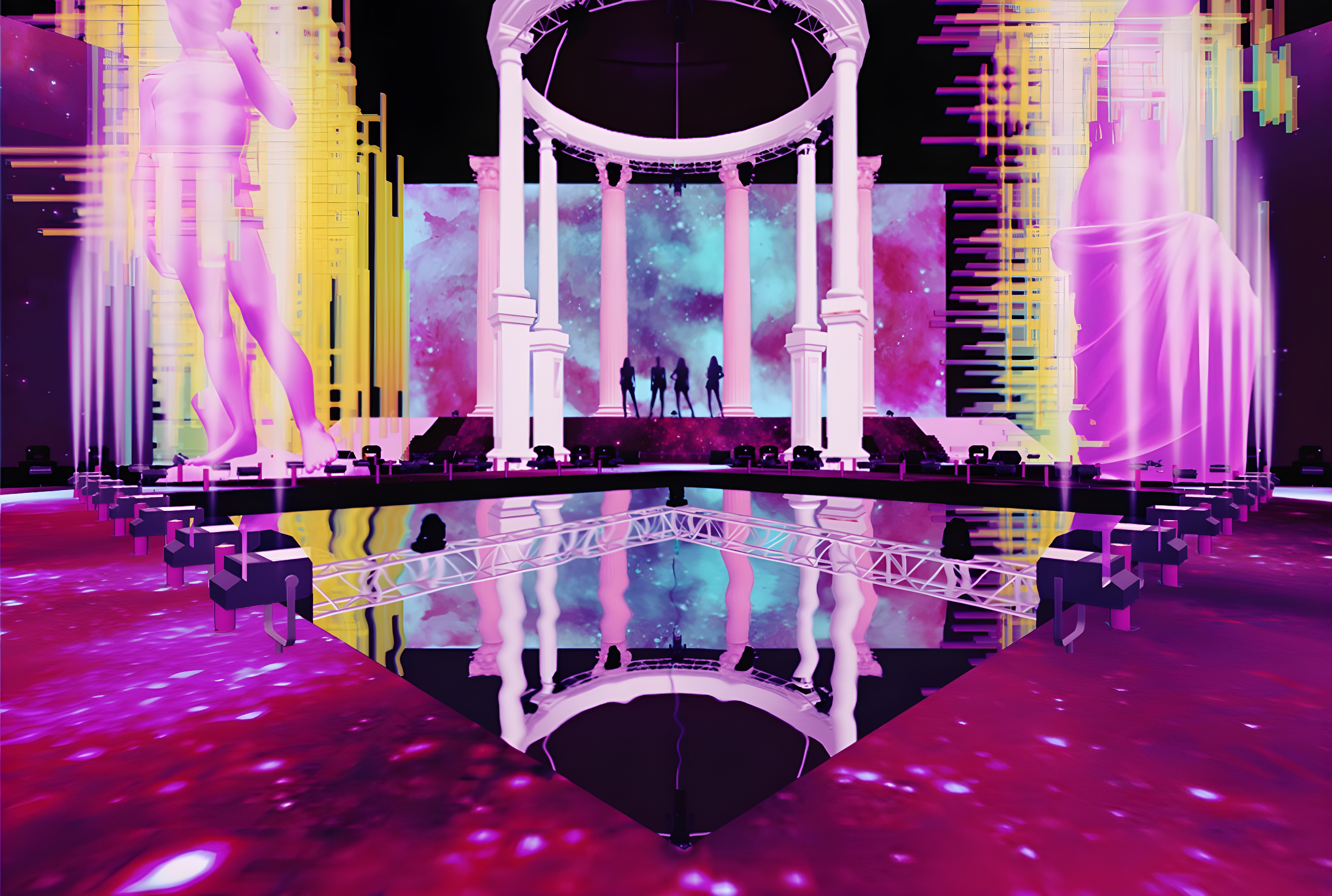 Stage setup with a neon pink and purple color scheme, featuring classical statues and columns, a large LED screen with a cosmic background, and silhouettes of performers in the center. Reflective pool in the foreground creates a mirror effect.