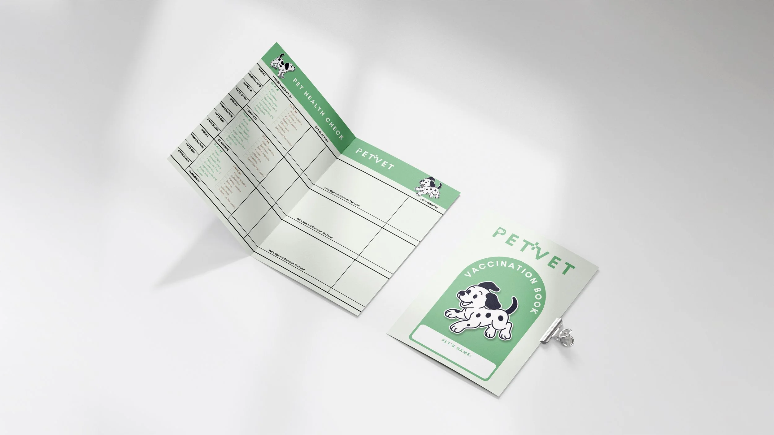 Pet vaccination booklet with a cartoon Dalmatian puppy on the cover and a pet health check chart inside, both labeled 'PETVET' with a green theme.