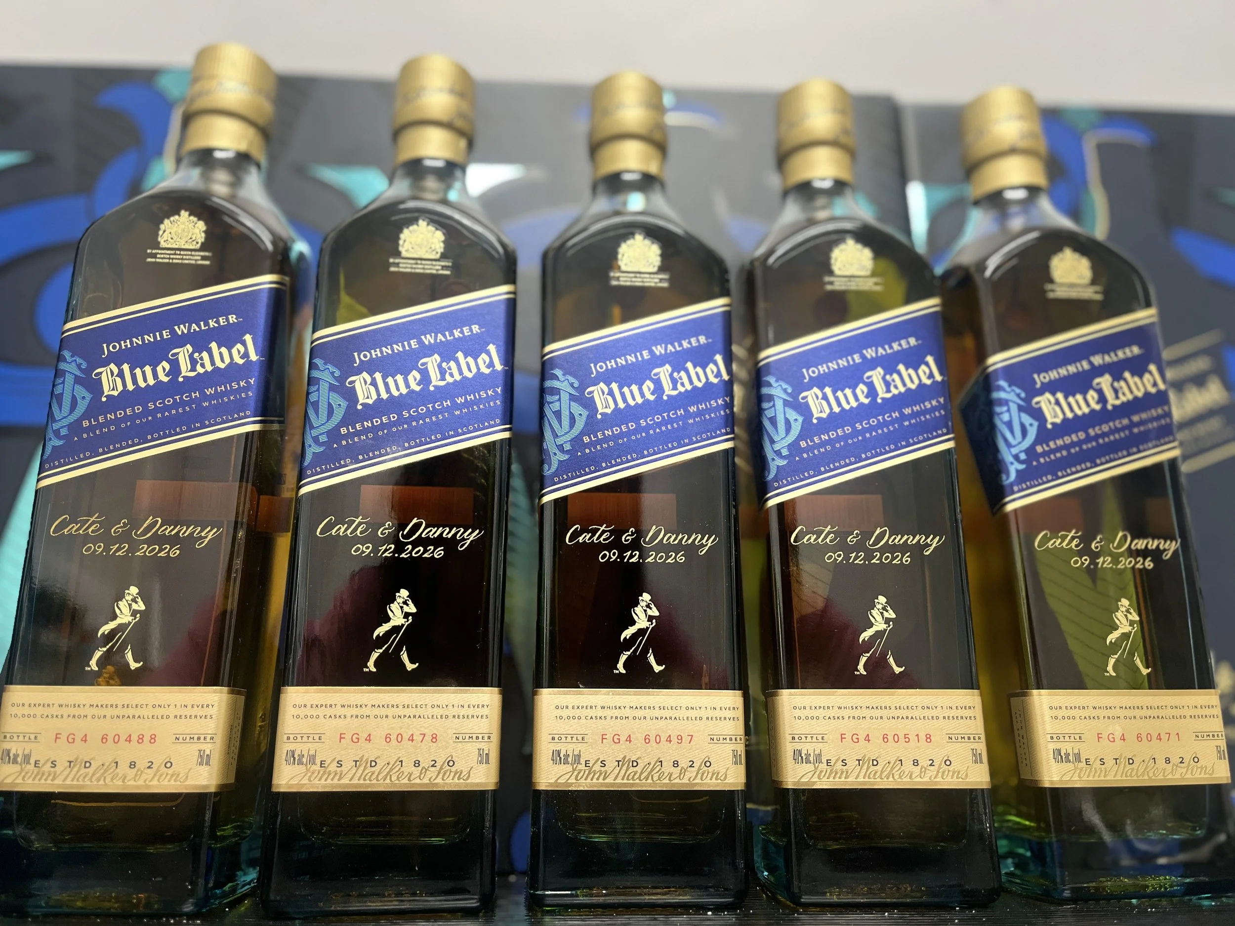 Chicago engraved bottles of alcohol blue label