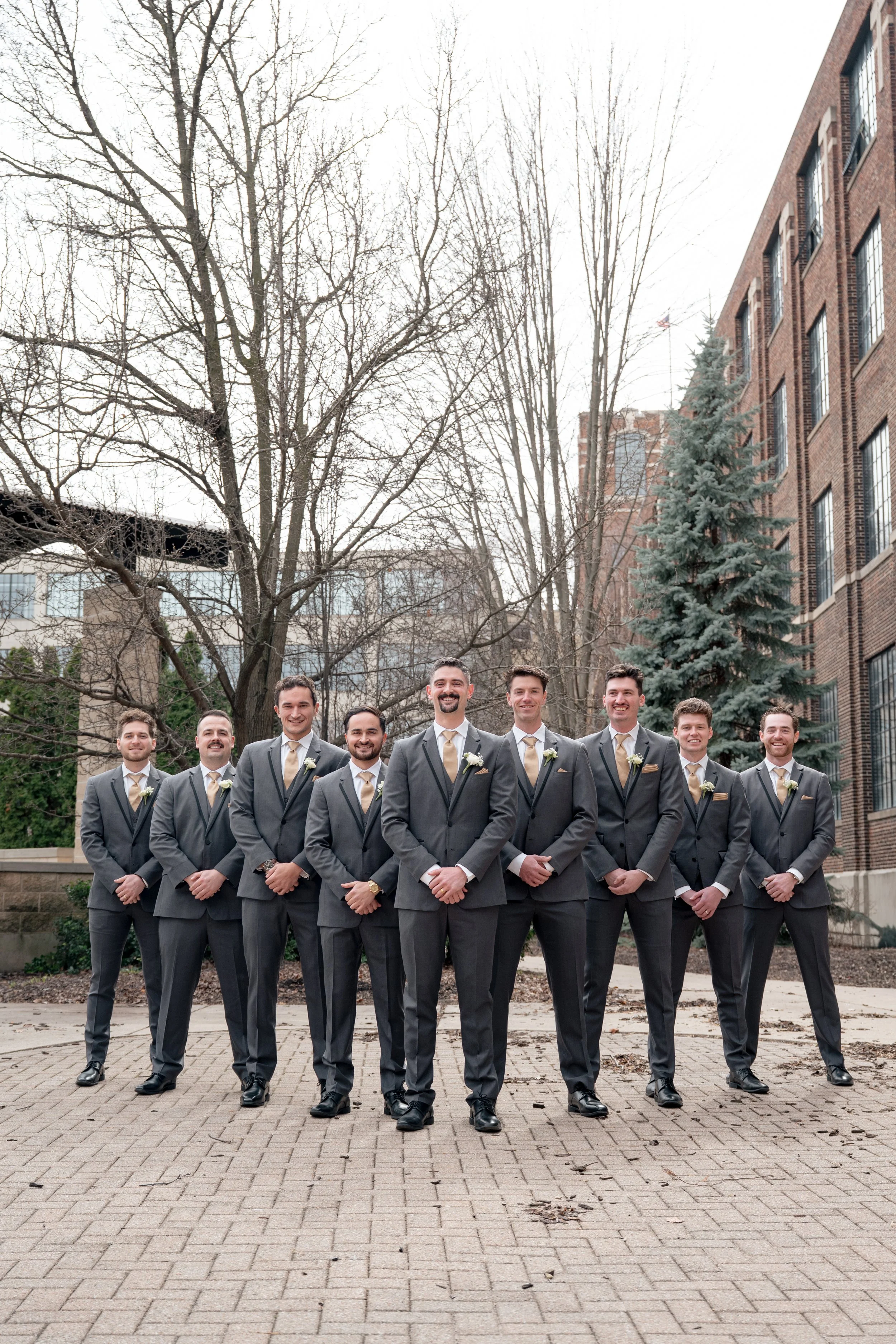 Groom and groomsmen photo at New Vintage Place in Grand Rapids