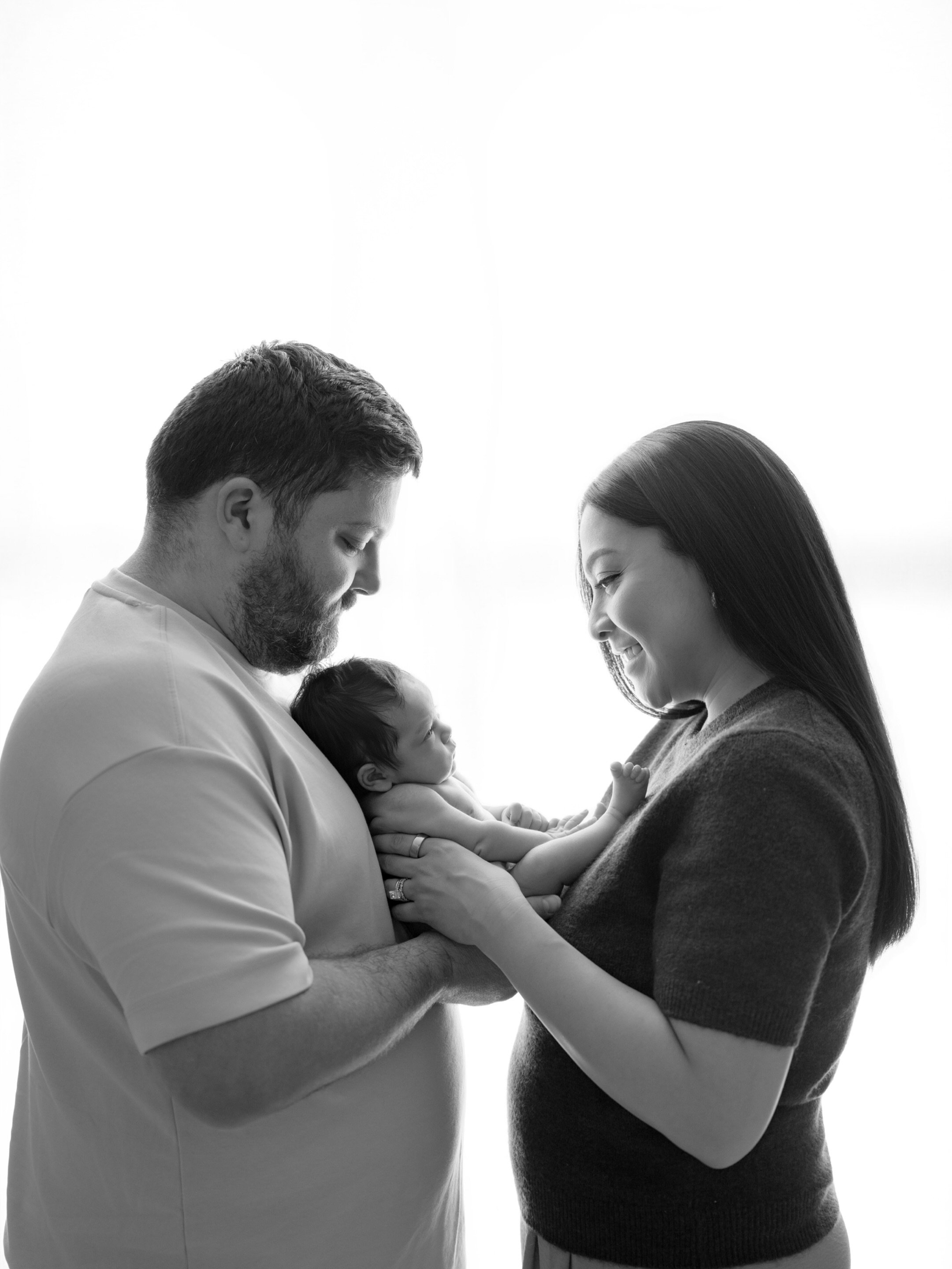 Their family of three became a family of four, and this time they were blessed with a sweet baby girl.

She was the snuggliest little thing, sleeping so peacefully through her session, while big brother couldn&rsquo;t stop loving on his new best frie