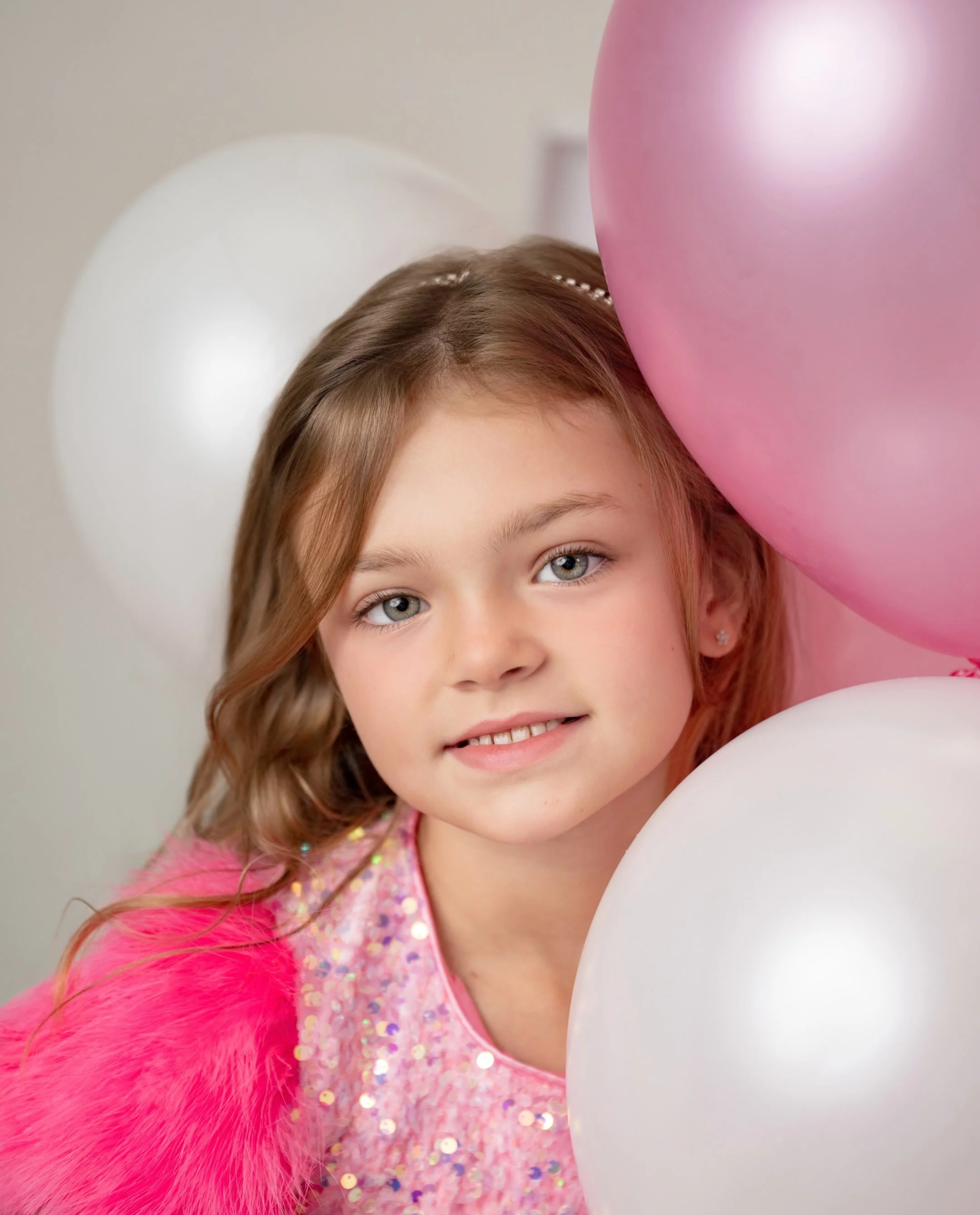 Lucky number 7! A glowing marquee, sparkly sequins and feather puff sleeves. This birthday girl came ready to shine ✨