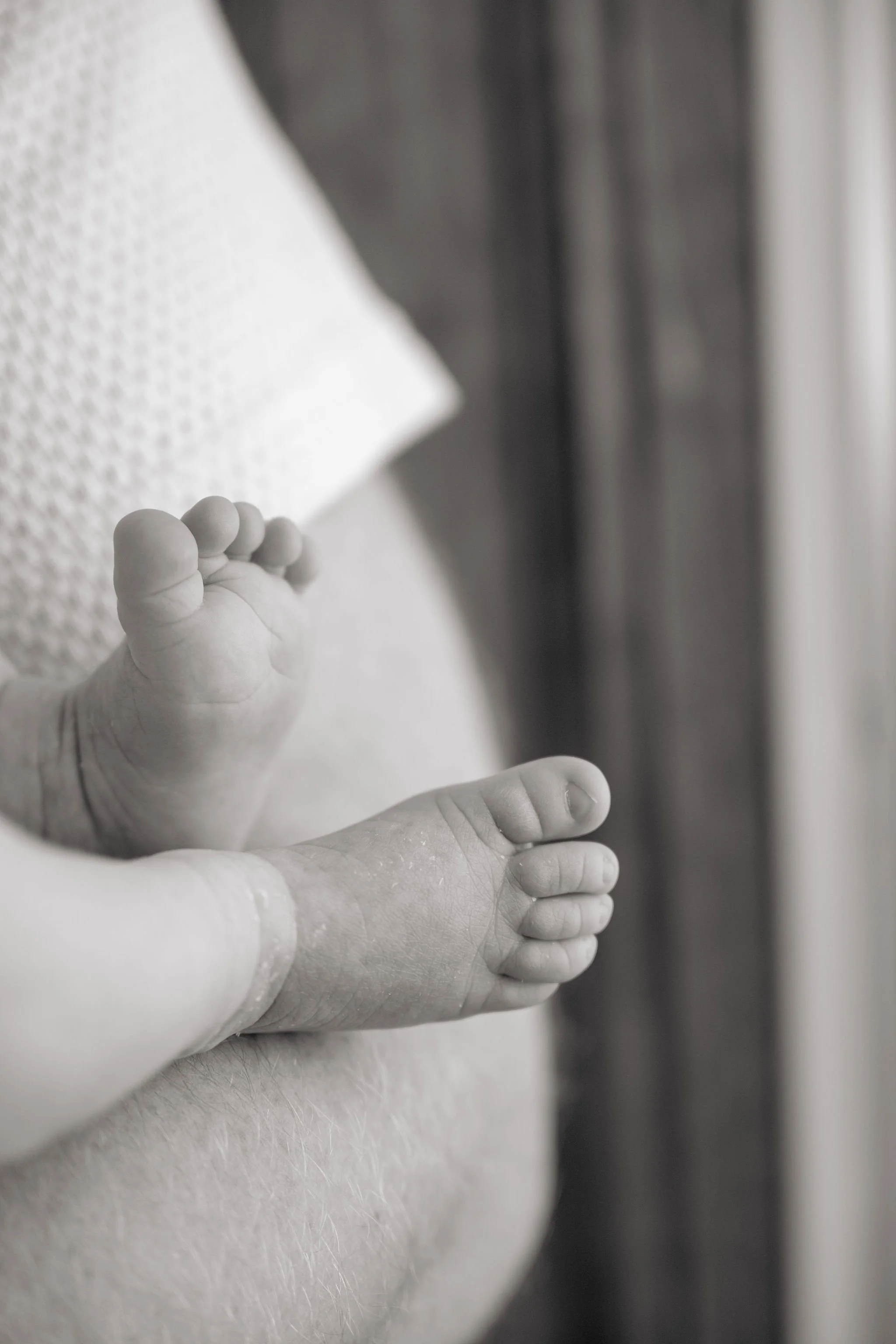 A newborn baby's feet and toes