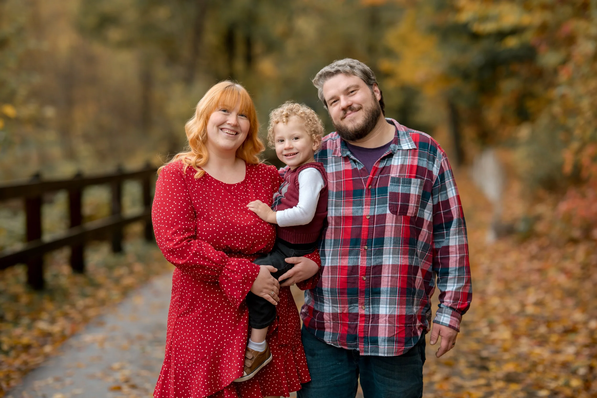 A family dressed up and smiling together for a photo in Allendale, Michigan