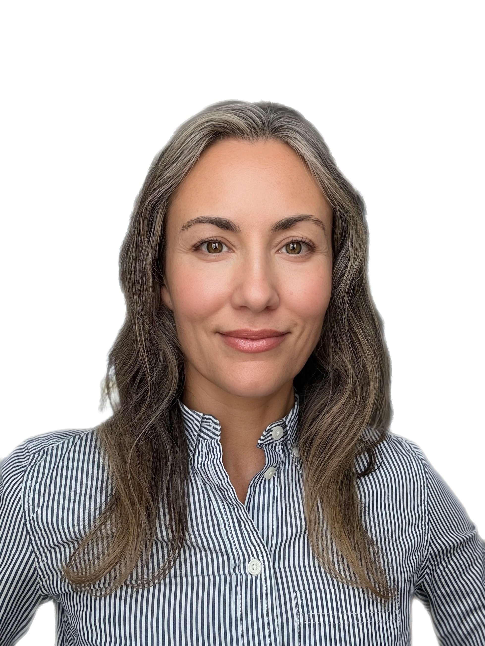 A woman with long, wavy hair wearing a black and white striped button-up shirt.