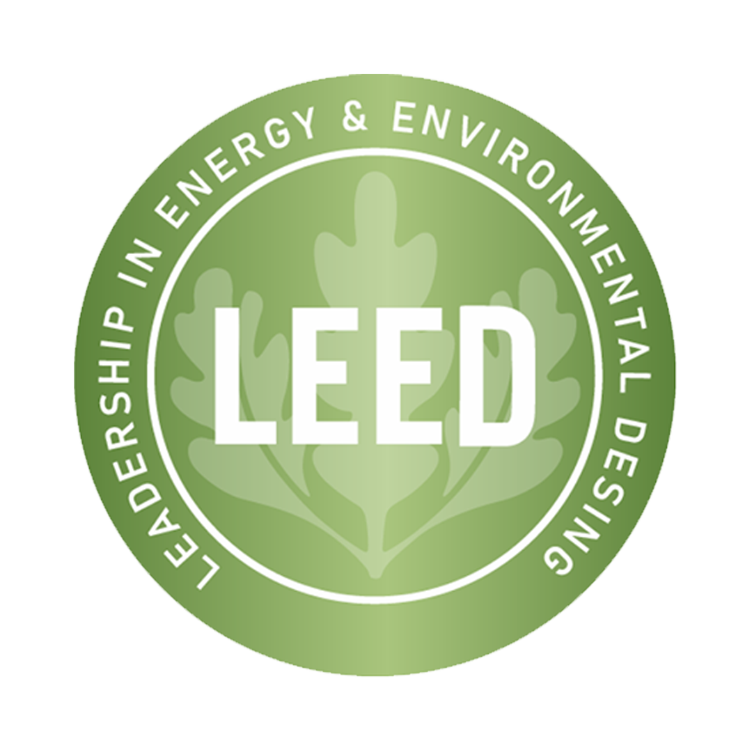 LEED certification badge indicating leadership in energy and environmental design, featuring a green circular emblem with a stylized leaf in the background.