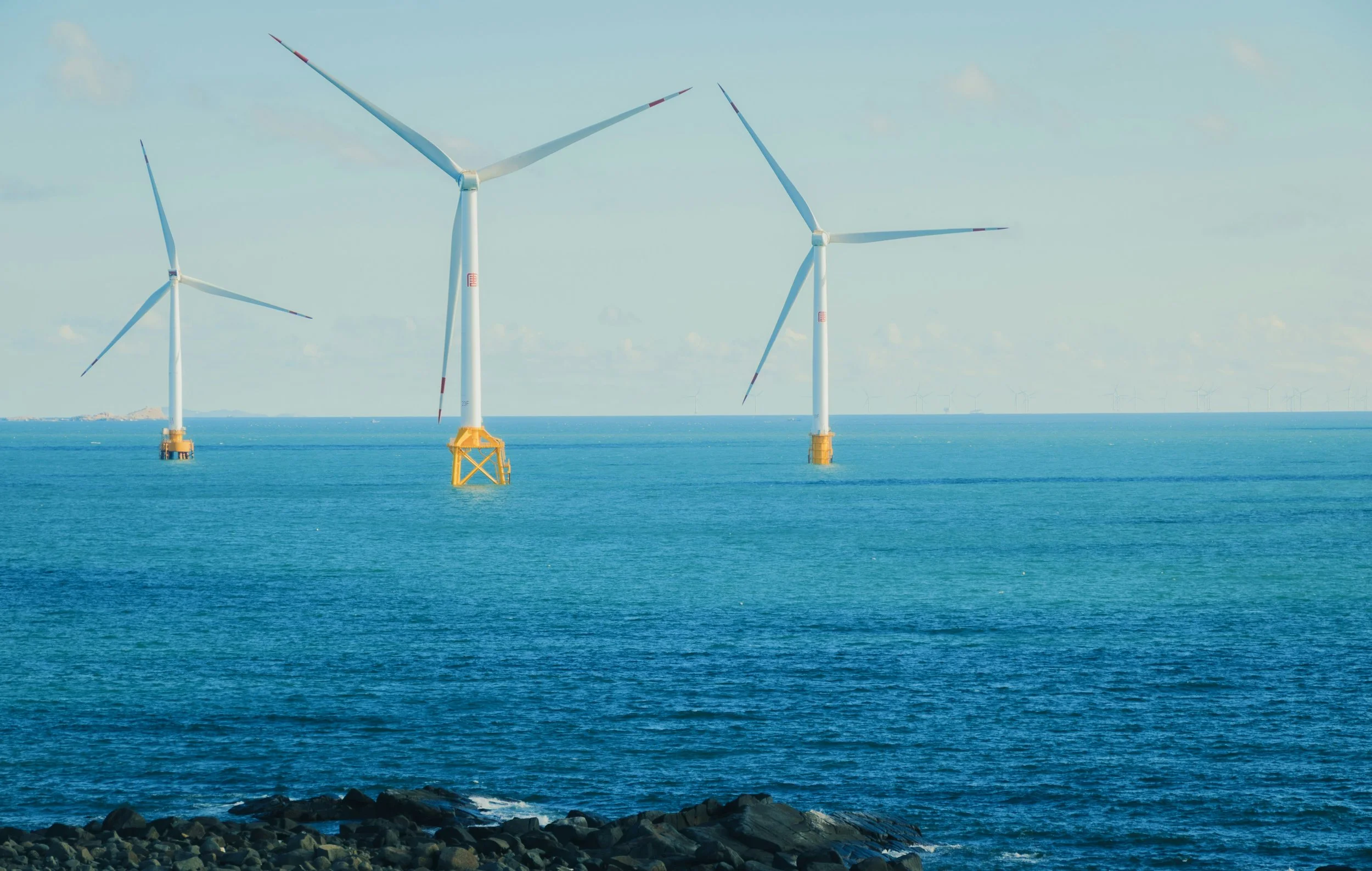 Three offshore wind turbines