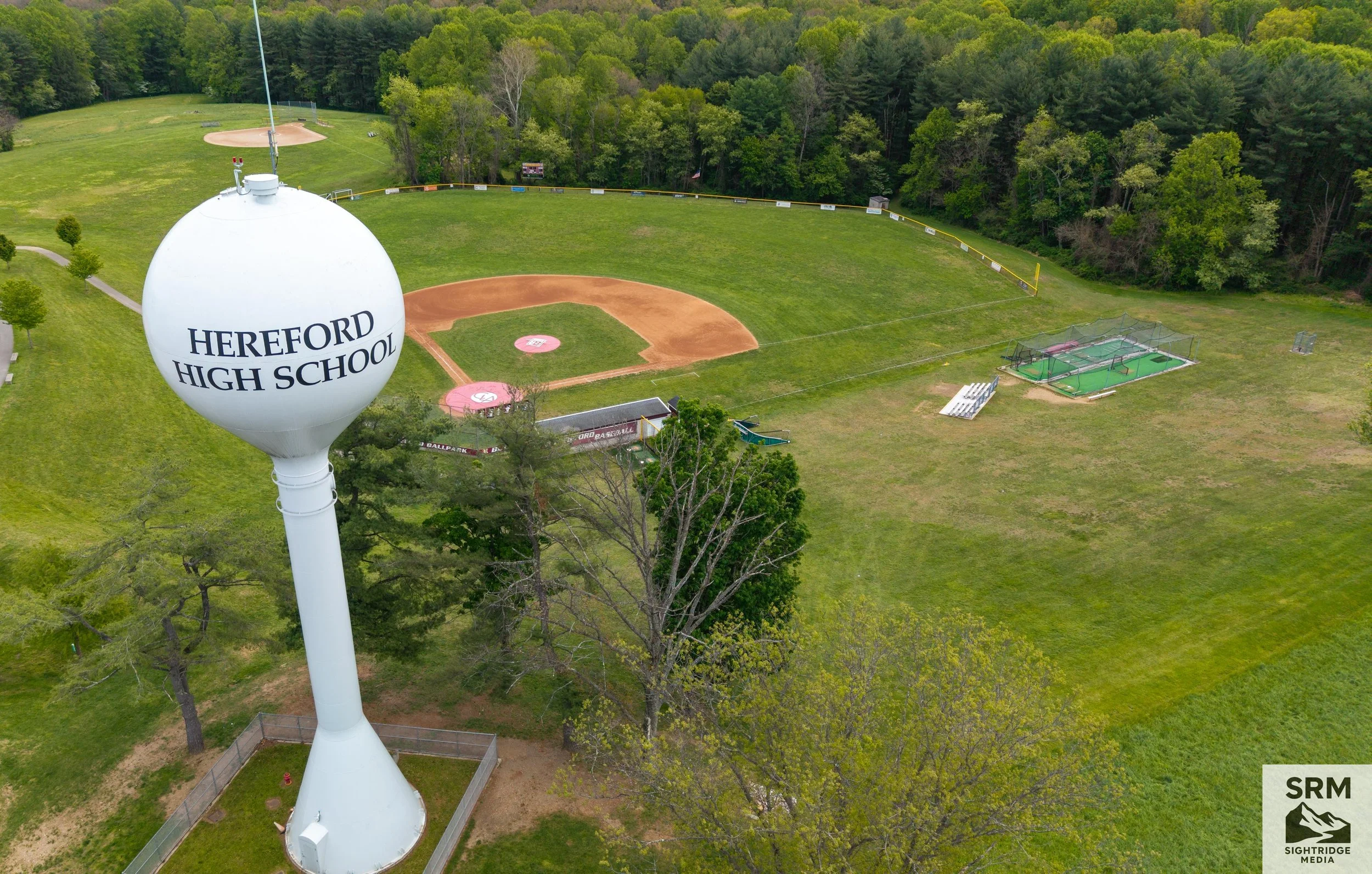 Water Tower Aerial Overview — Hereford High School, Baltimore County MD — Full tower documentation including surrounding grounds and facilities.