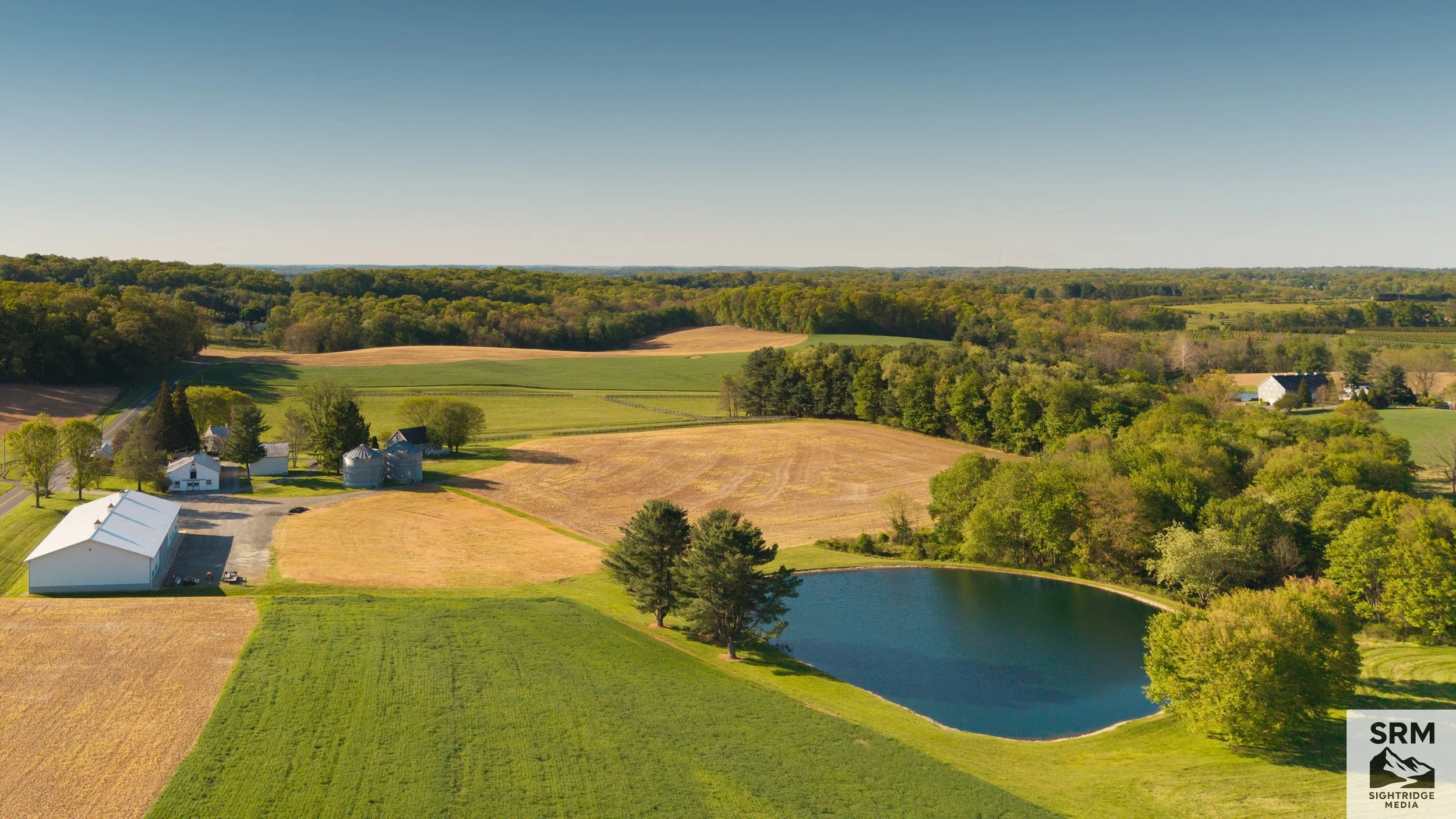 Agricultural Property Overview — Aerial survey showing field layout, farm pond, and surrounding property — Northern Maryland.