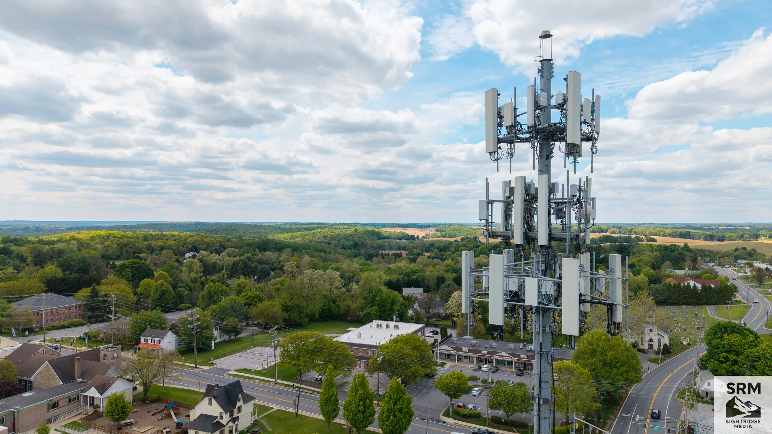 Cell Tower Infrastructure Documentation - Close-up aerial documentation of antenna arrays, mounting hardware, and tower structure — no bucket truck required.