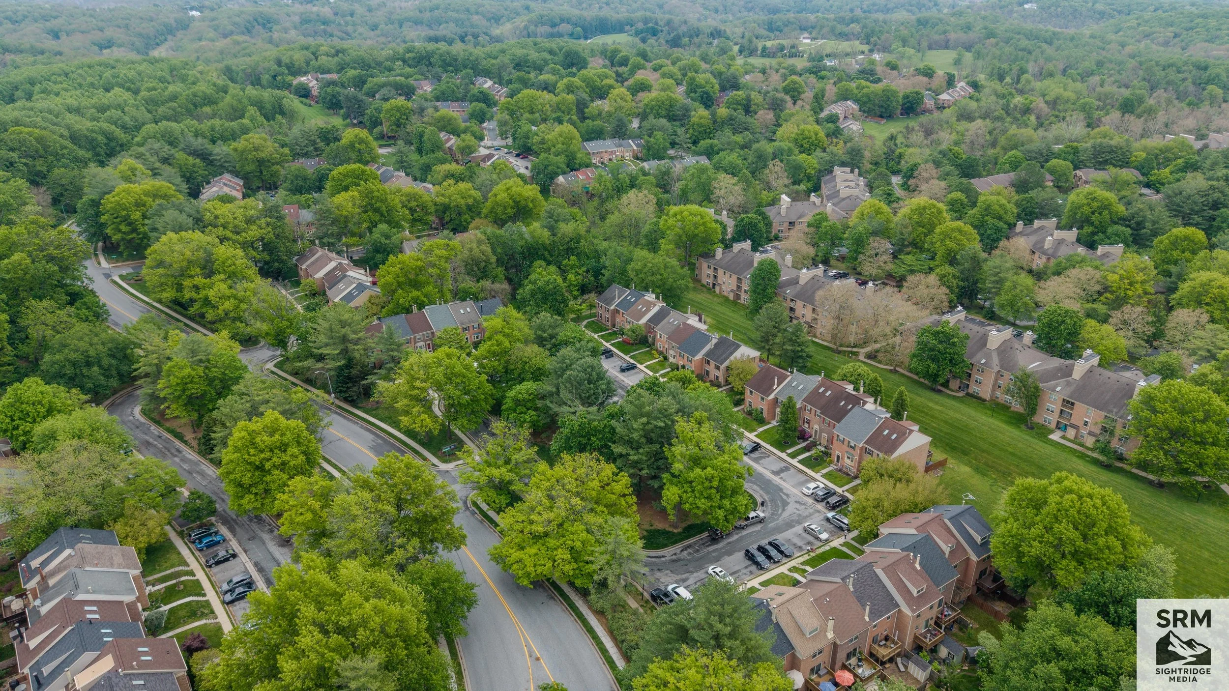Neighborhood Overview — Aerial documentation of residential community showing street layout, lot sizes, and tree canopy — Sparks, MD.