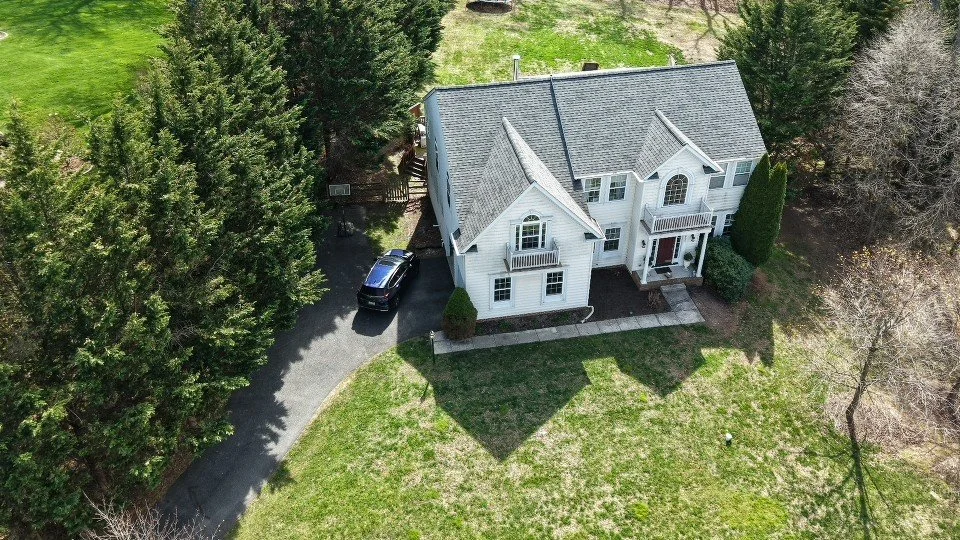 Residential Aerial — Close overhead view showing roofline, lot layout, and landscaping — Parkton, MD.