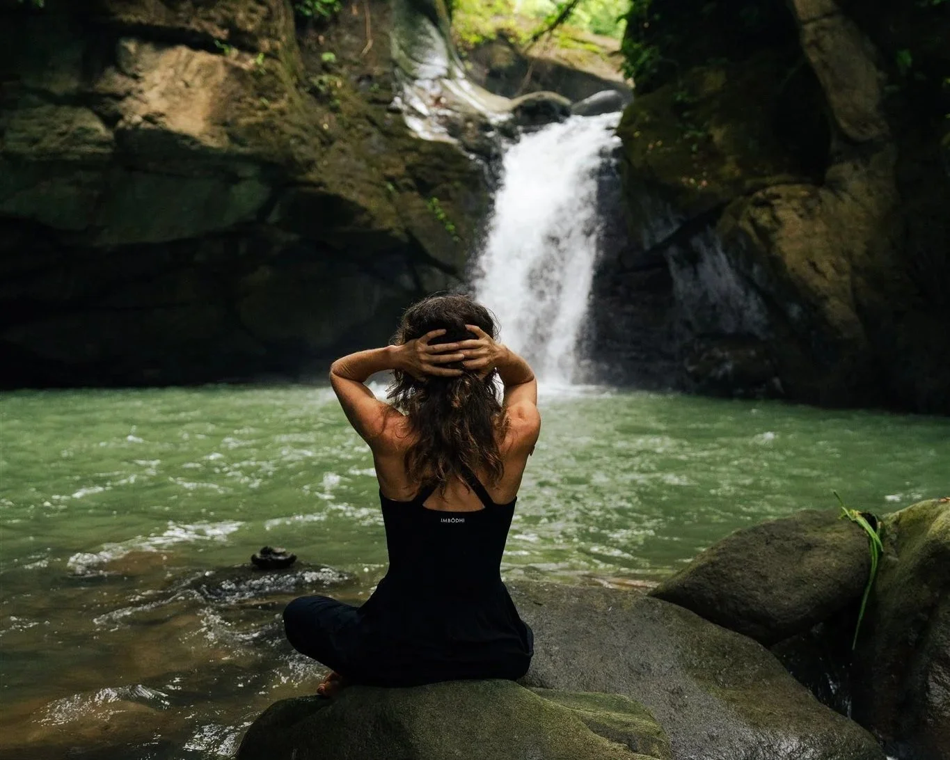 V.Woman sitting at falls.NateRoss.jpg