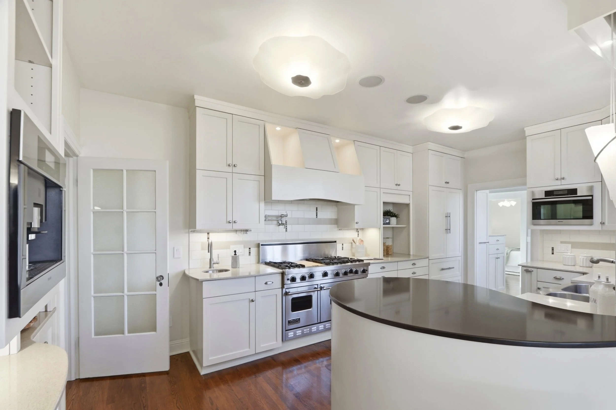 Redesigned chef's kitchen features Miele and Viking appliances.