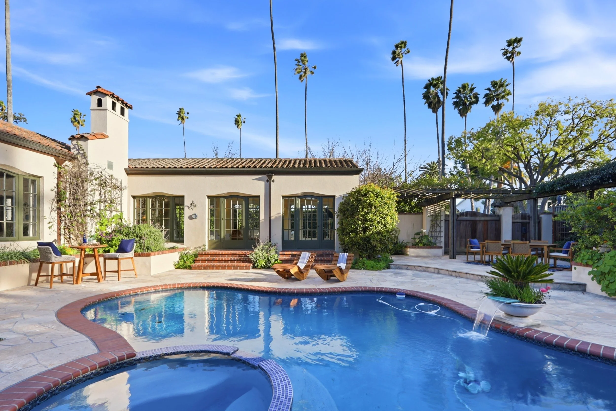 Pool with integrated spa newly resurfaced for years of effortless enjoyment.