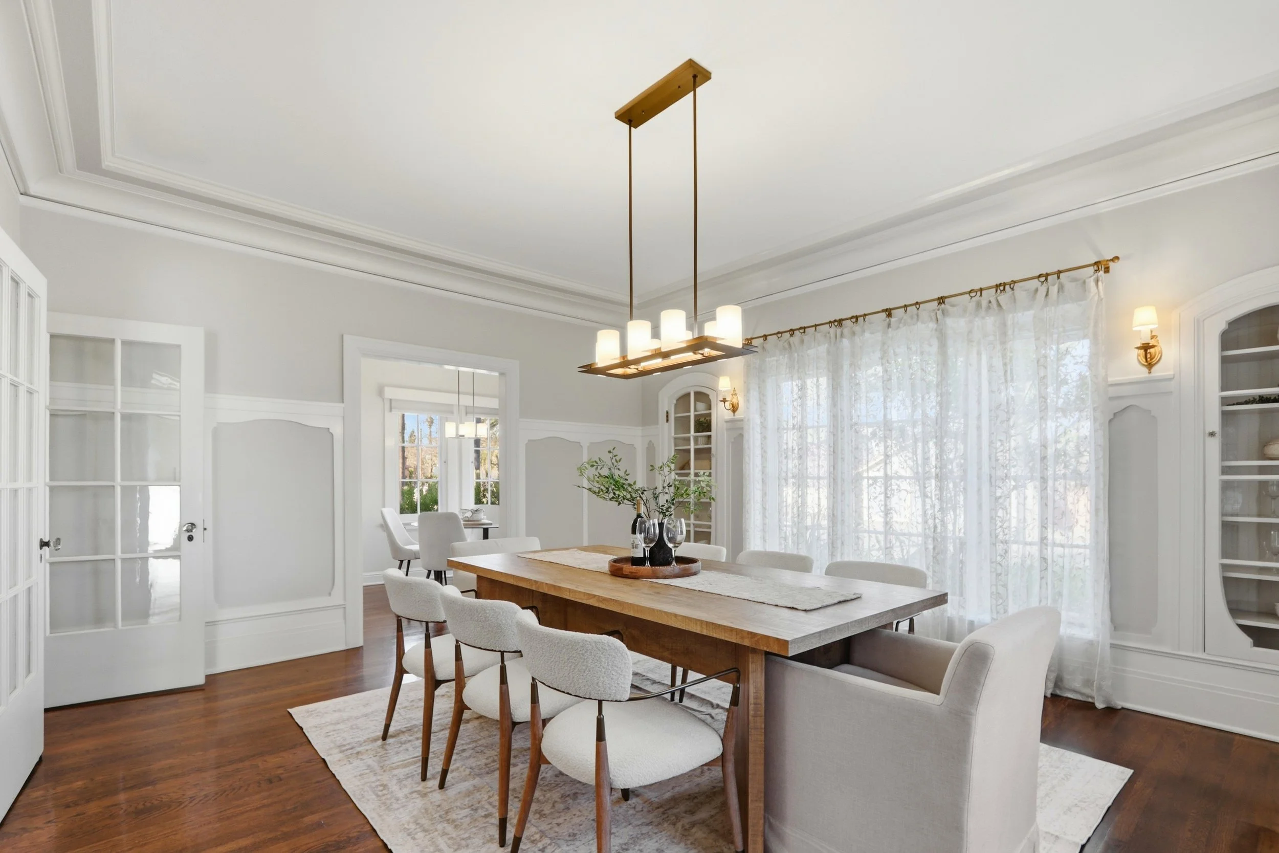 Formal living room with original built-ins for elegant dining.