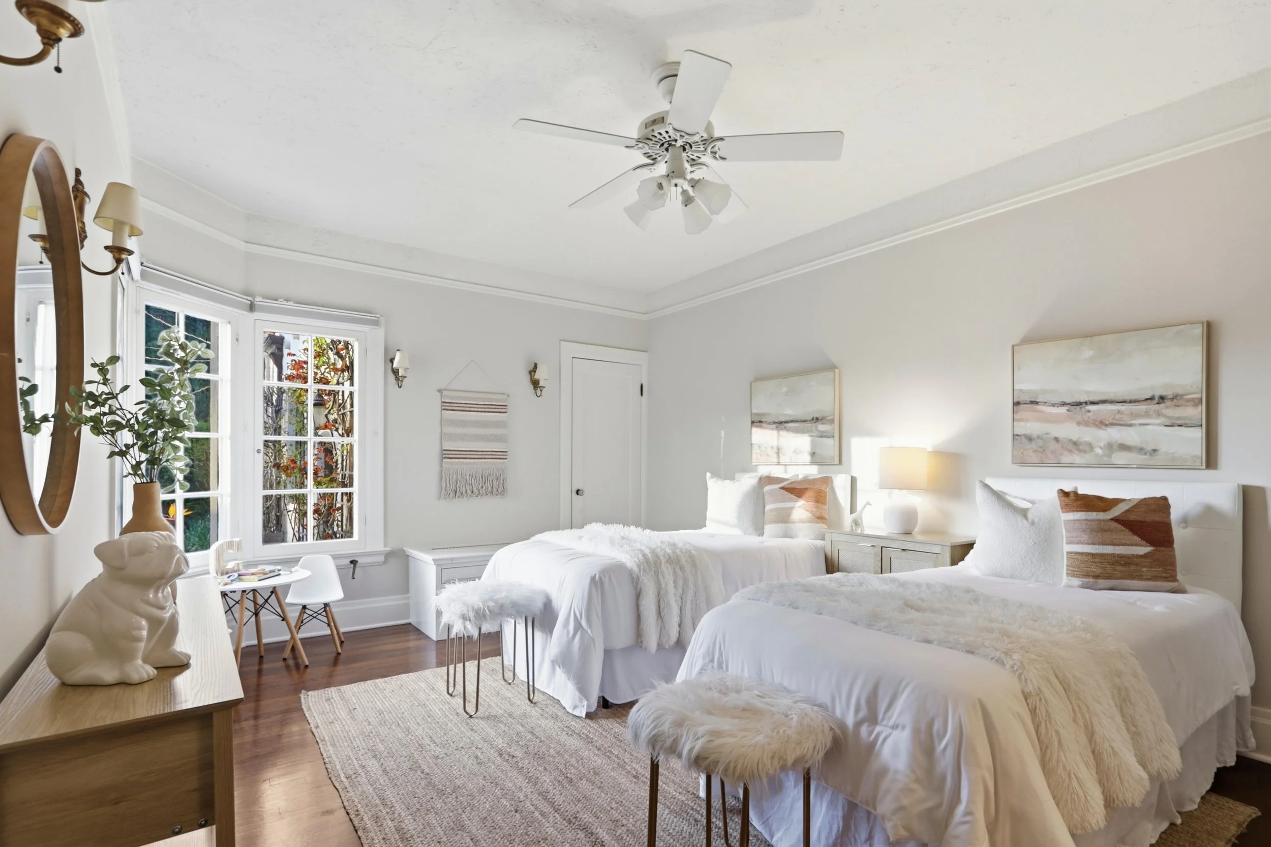 2 of 3 additional bedrooms offering space for family or dedicated workspace.