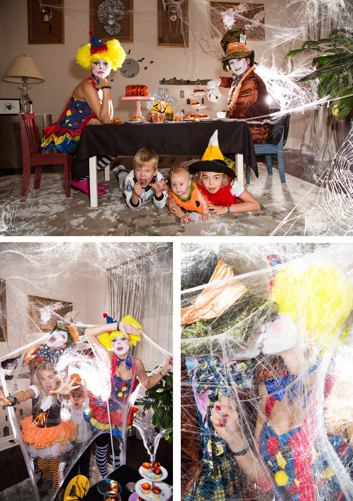 Children and adults dressed as Halloween characters, including clowns and witches, at a Halloween party with decorations, cobwebs, and fake spiders.