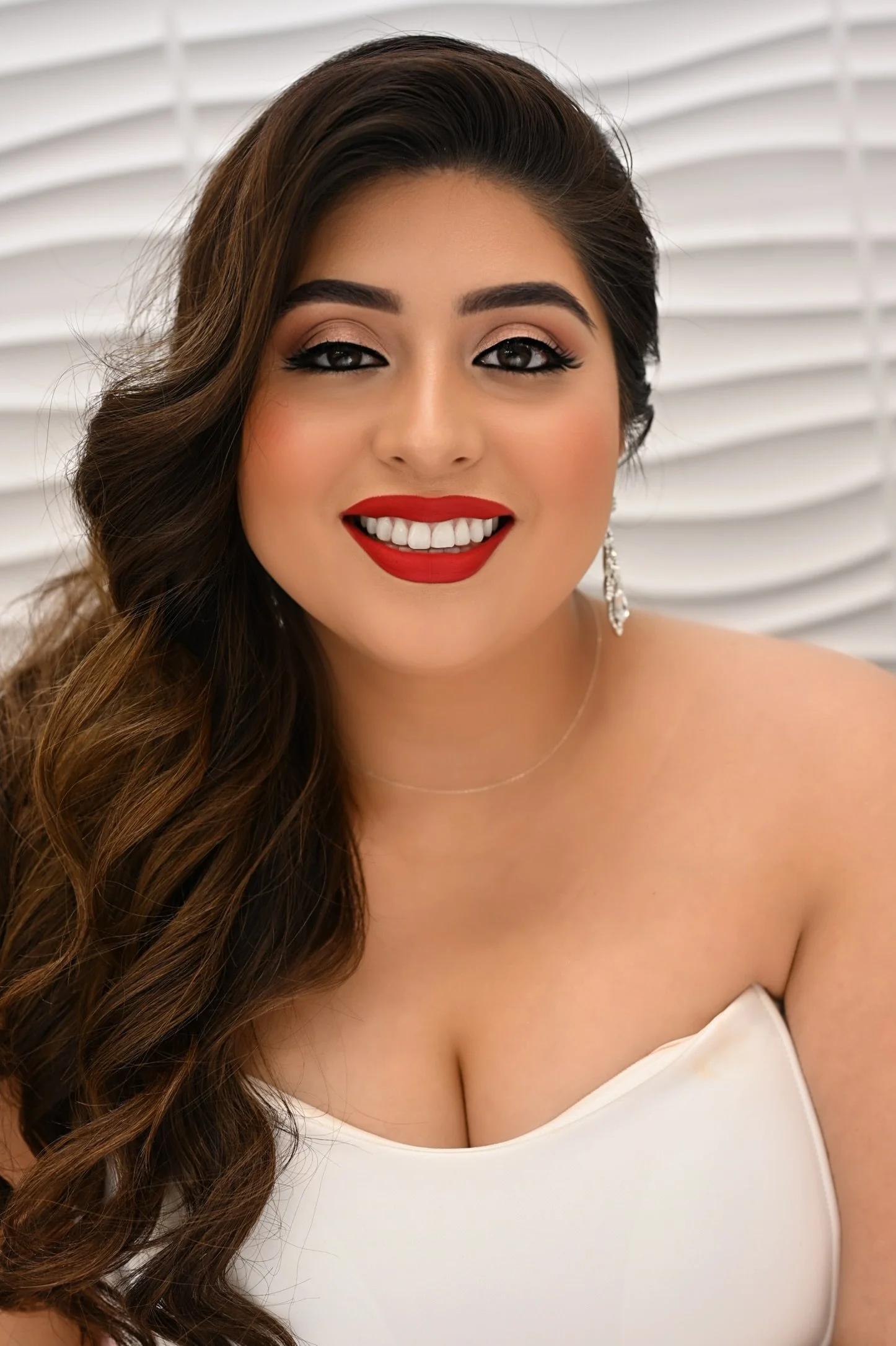 Bride wearing soft, elevated glam with radiant skin and neutral tones, showcasing the difference between soft glam and natural glam bridal makeup.