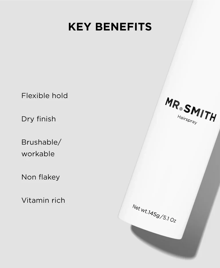 A white cylindrical can of Mr. Smith Hairspray with the net weight of 145 grams or 5.1 ounces, labeled with key benefits including flexible hold, dry finish, brushable and workable, non-flaky, and vitamin-rich.