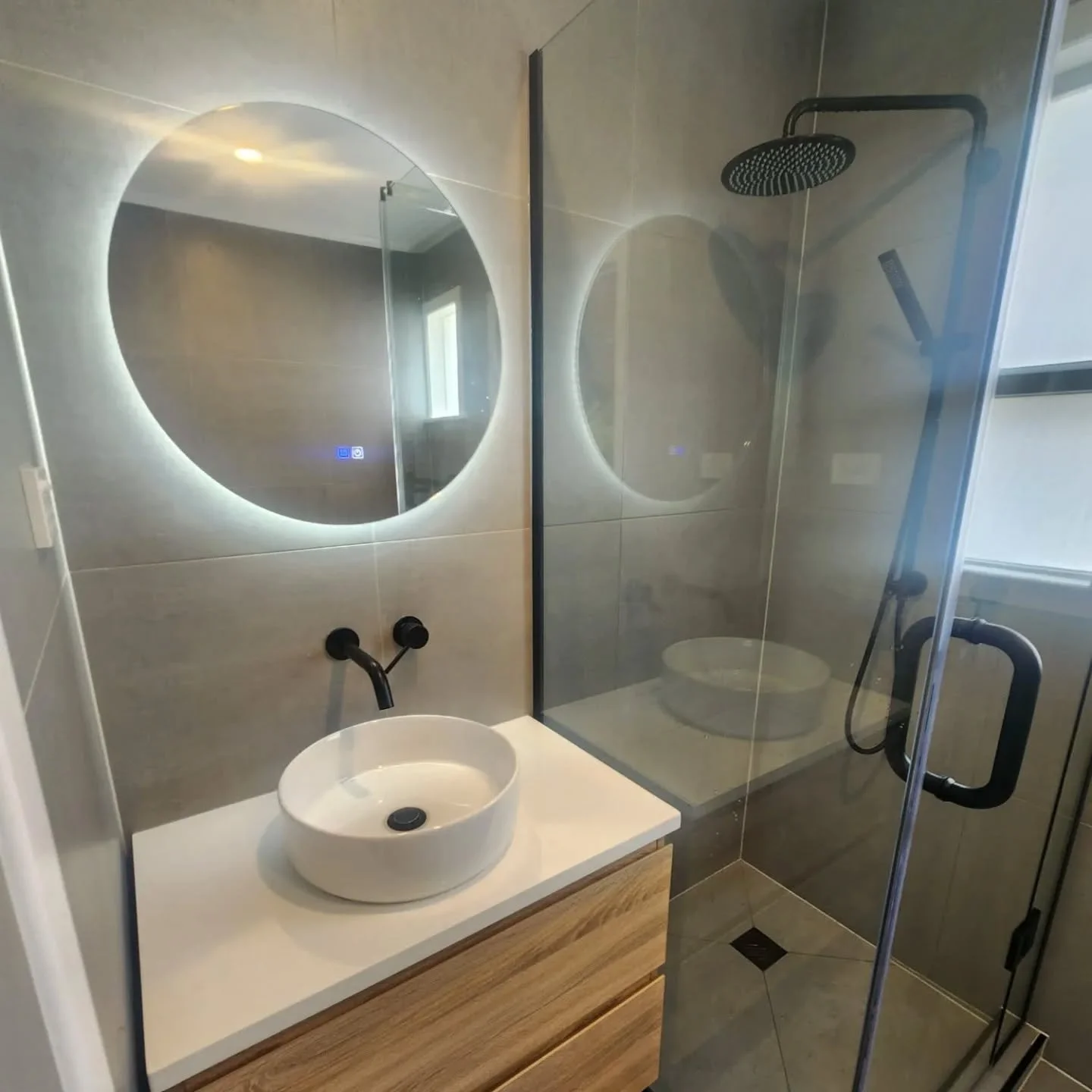 Complete home renovation bathroom, laundry, kitchen and flooring.
White reflects natural light, helping to open up the space and make a kitchen feel airy and spacious.

Tiling your bathroom all the way to the ceiling can make the space feel larger an